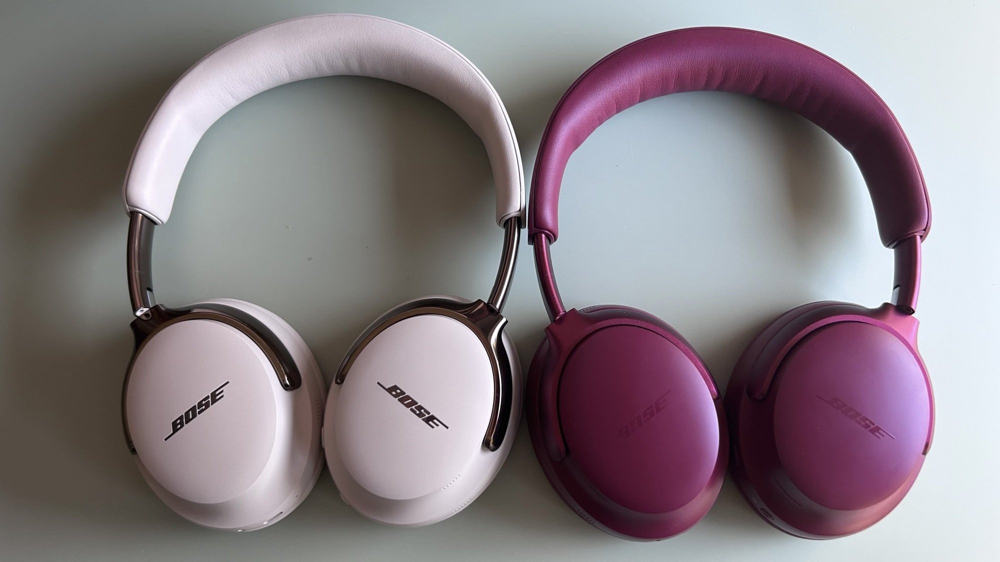 bose qc ultra headphones laying flat on desk top