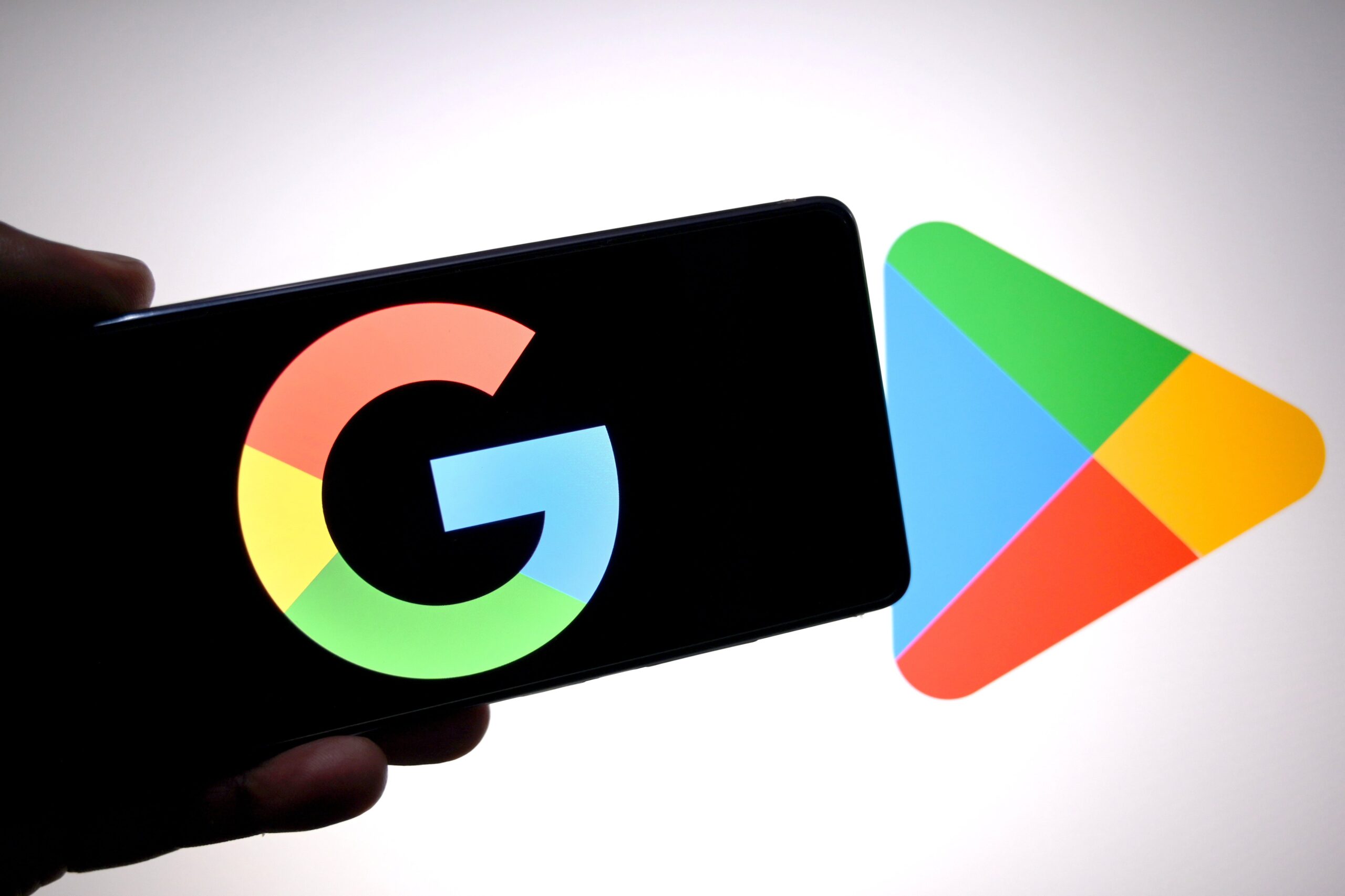 Google Play store logo next to Google logo