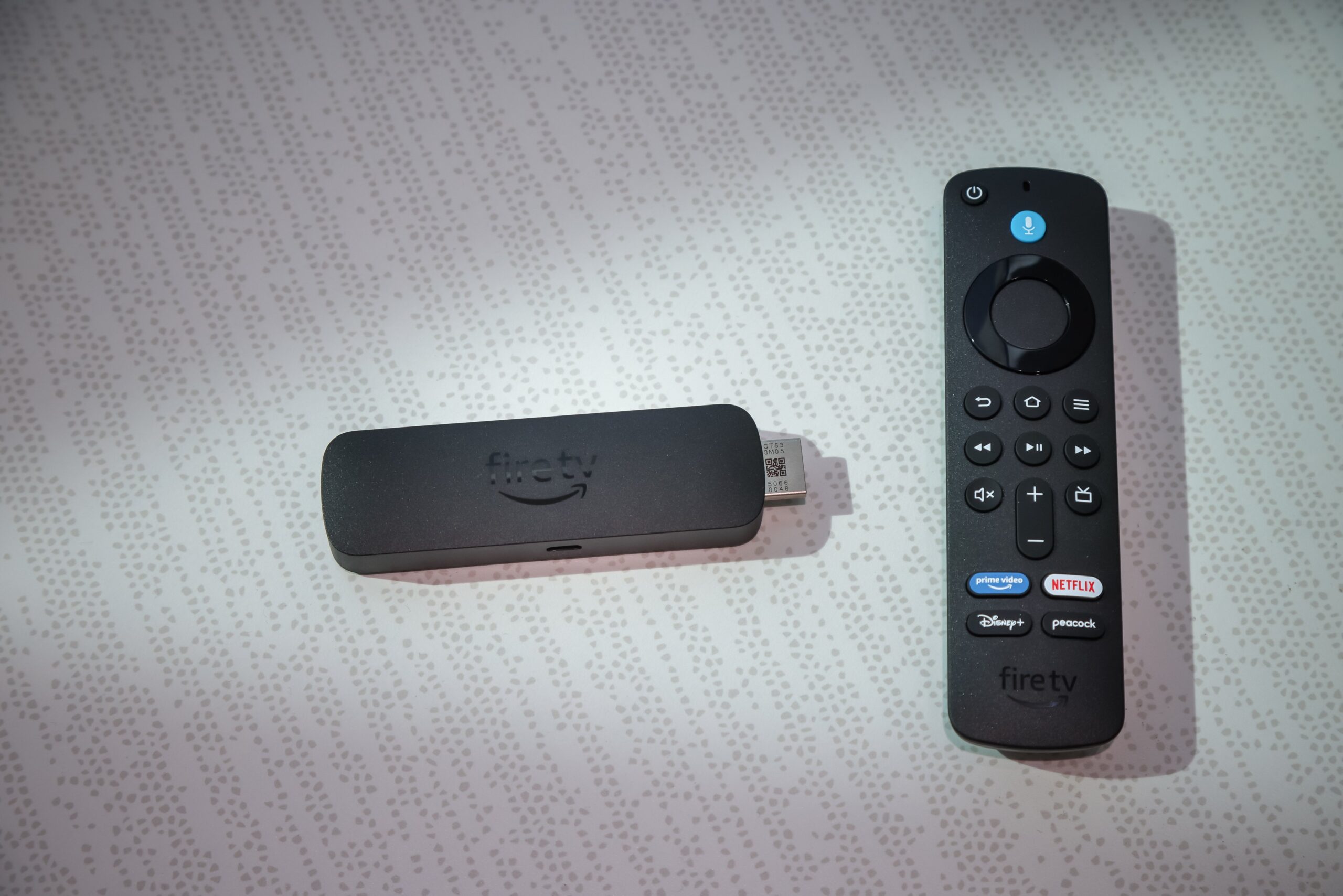 a fire stick on a gray background