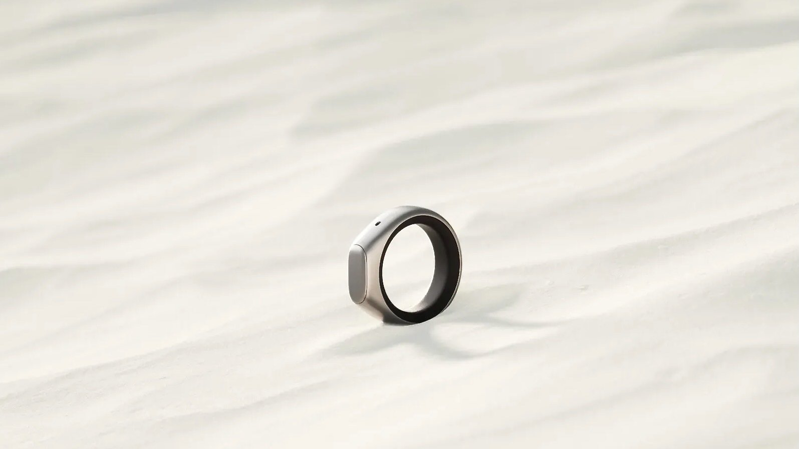 stream smart ring buried in sand