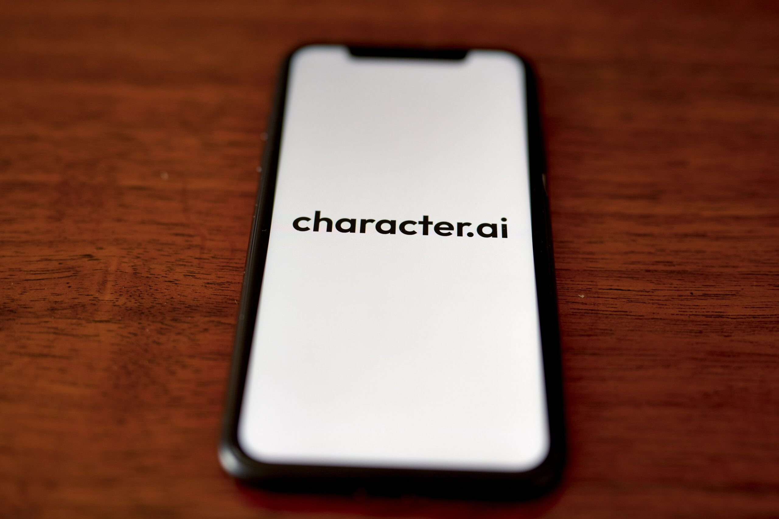 The Charcter.AI logo on a smartphone