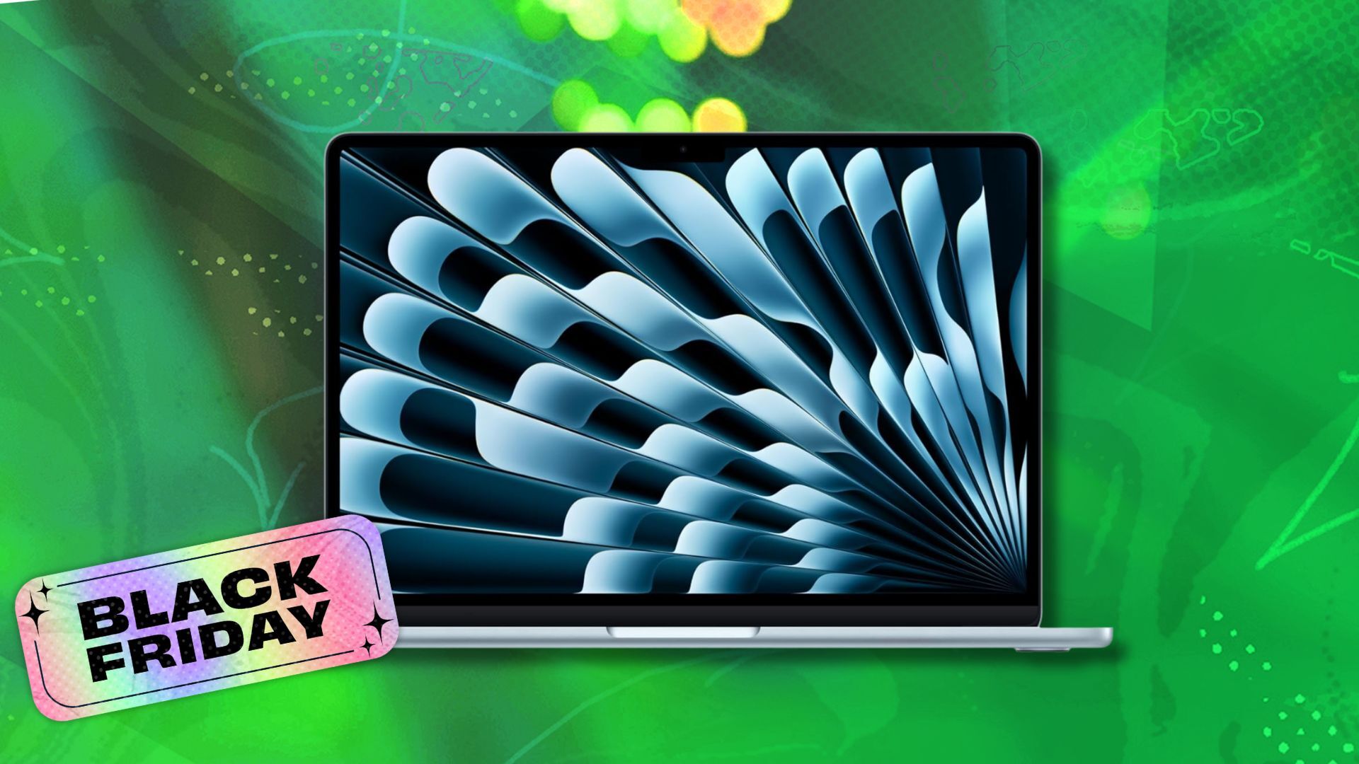 apple macbook air against a green patterned background