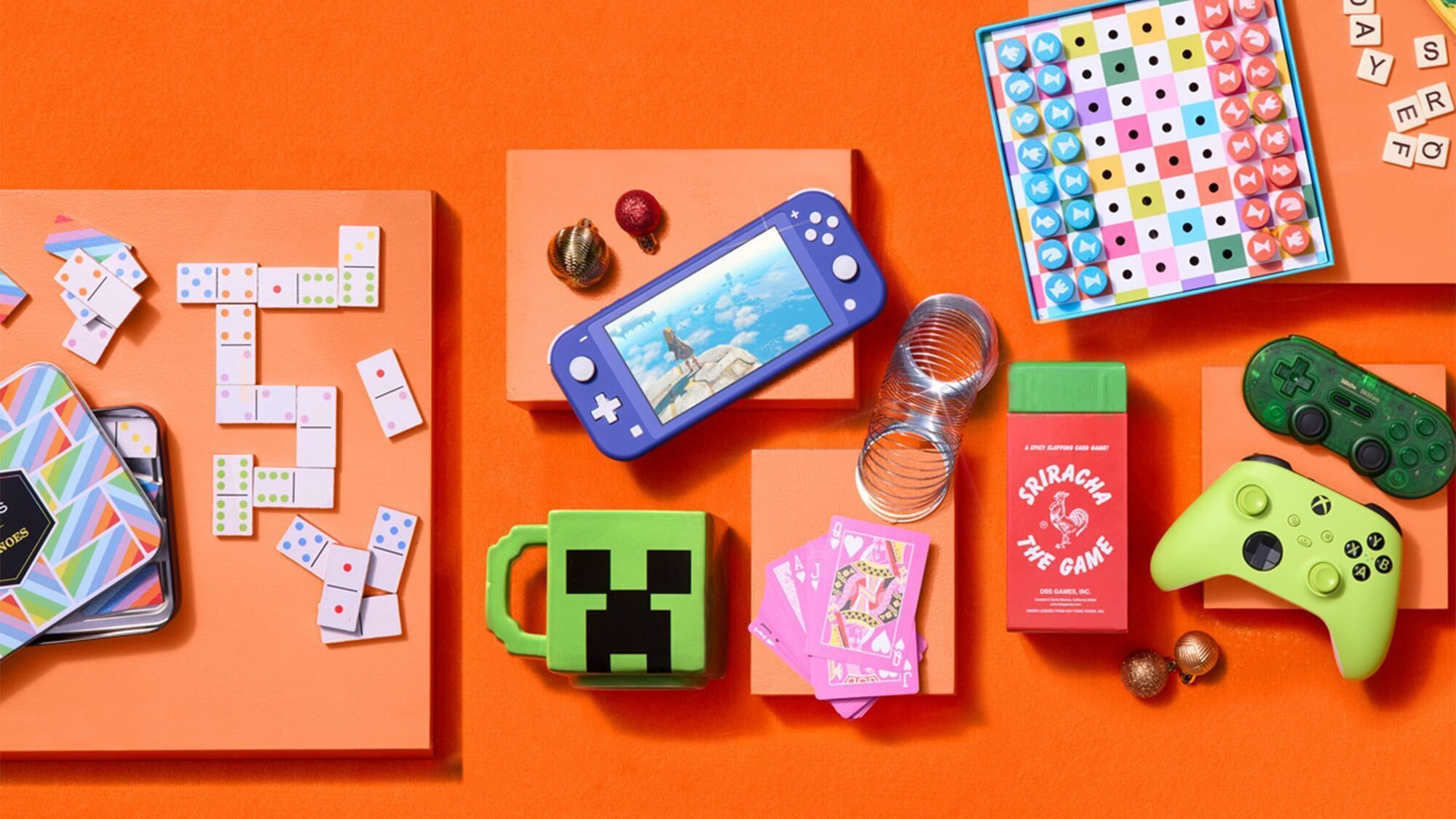 toys and video games laid out on orange table