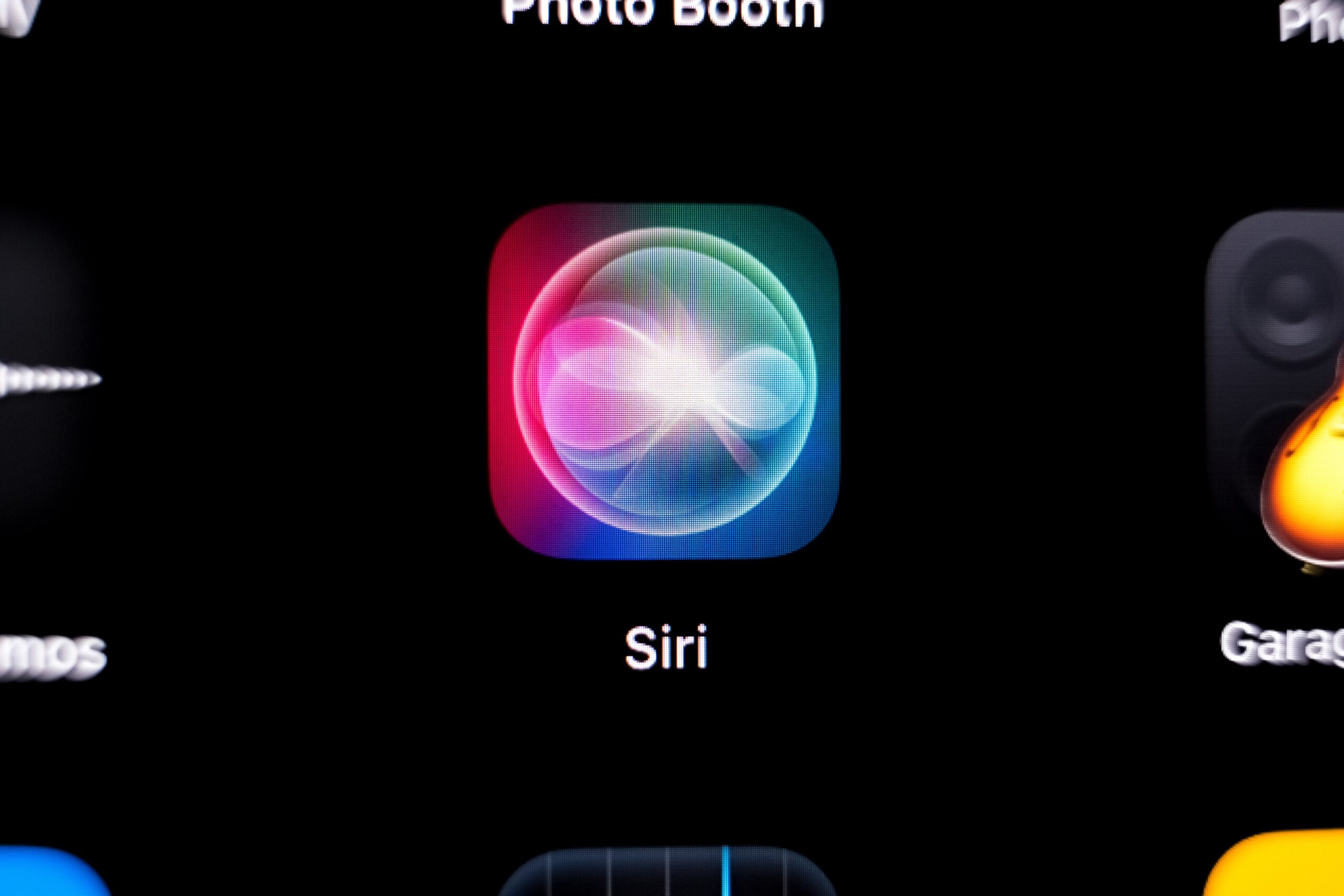 The Siri application appears on a smartphone screen