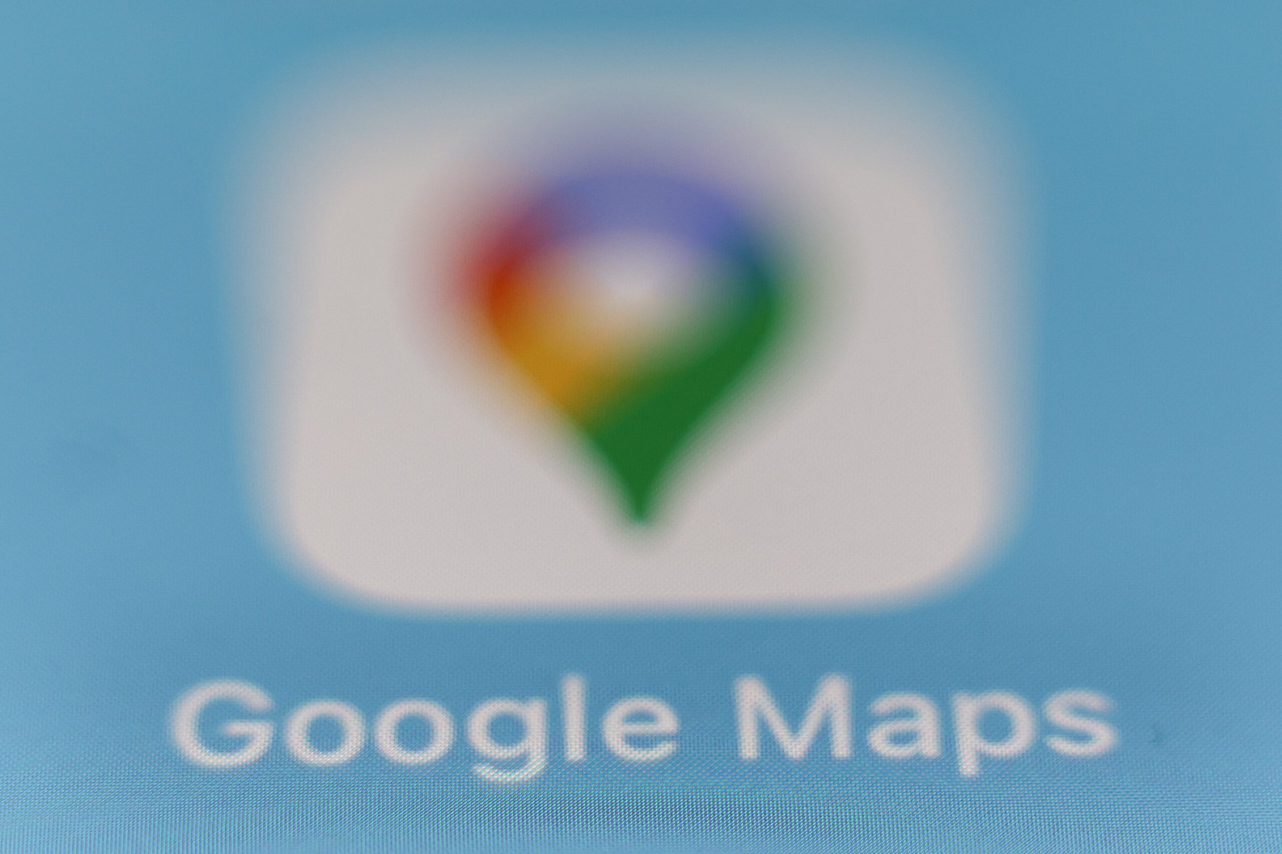 a blurred google maps logo