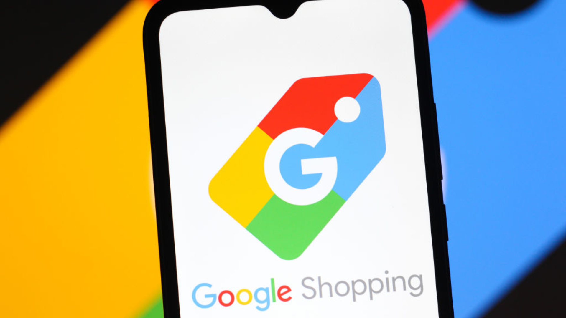 The Google Shopping logo is seen displayed on a smartphone screen.