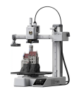 Bambu Lab A1 mini 3D printing a castle figurine