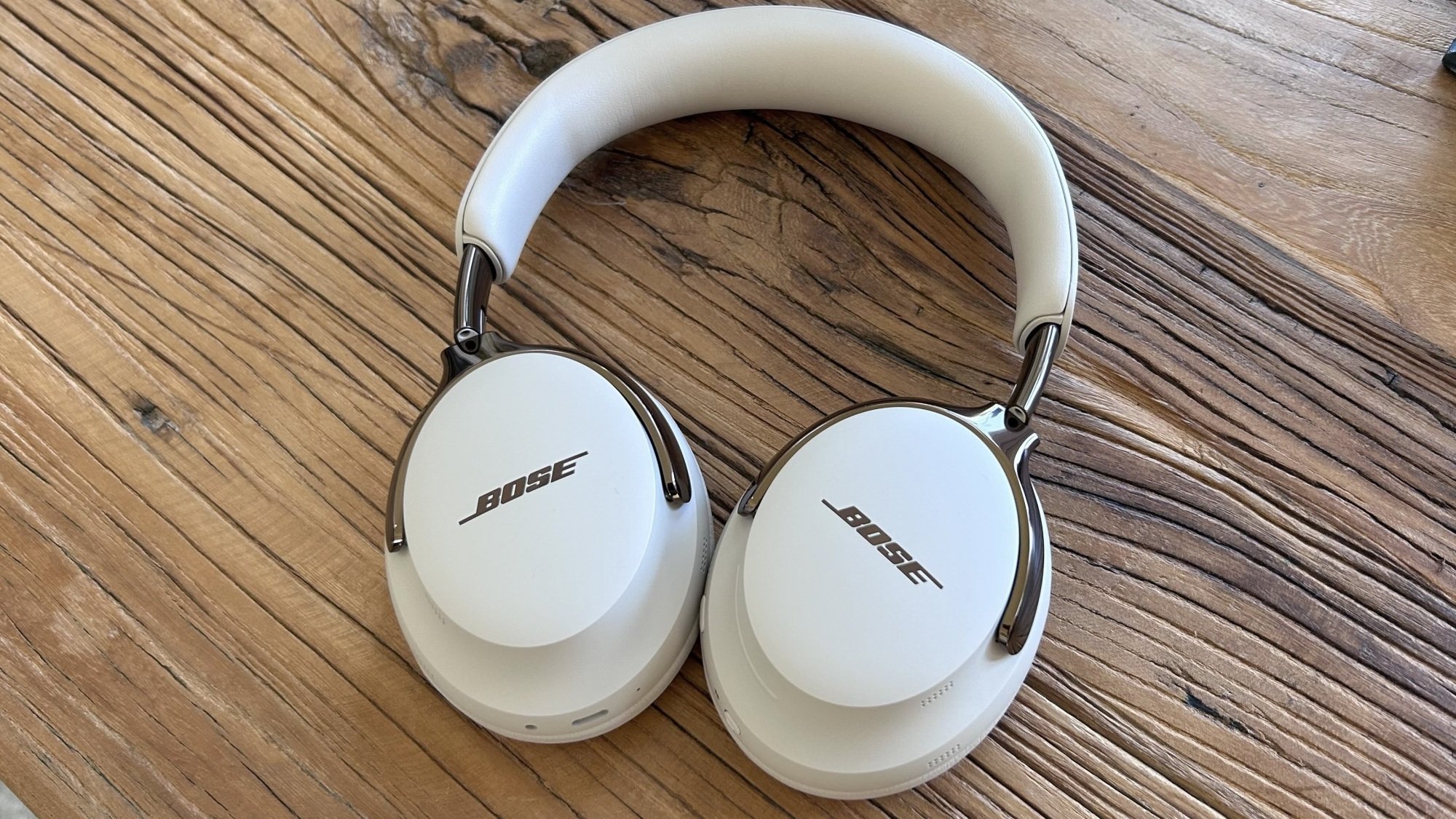 driftwood sand bose headphones on tabletop
