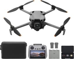 dji mini 5 pro drone, bag, controller, and batteries against a white background