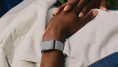 whoop mg fitness tracker on wrist