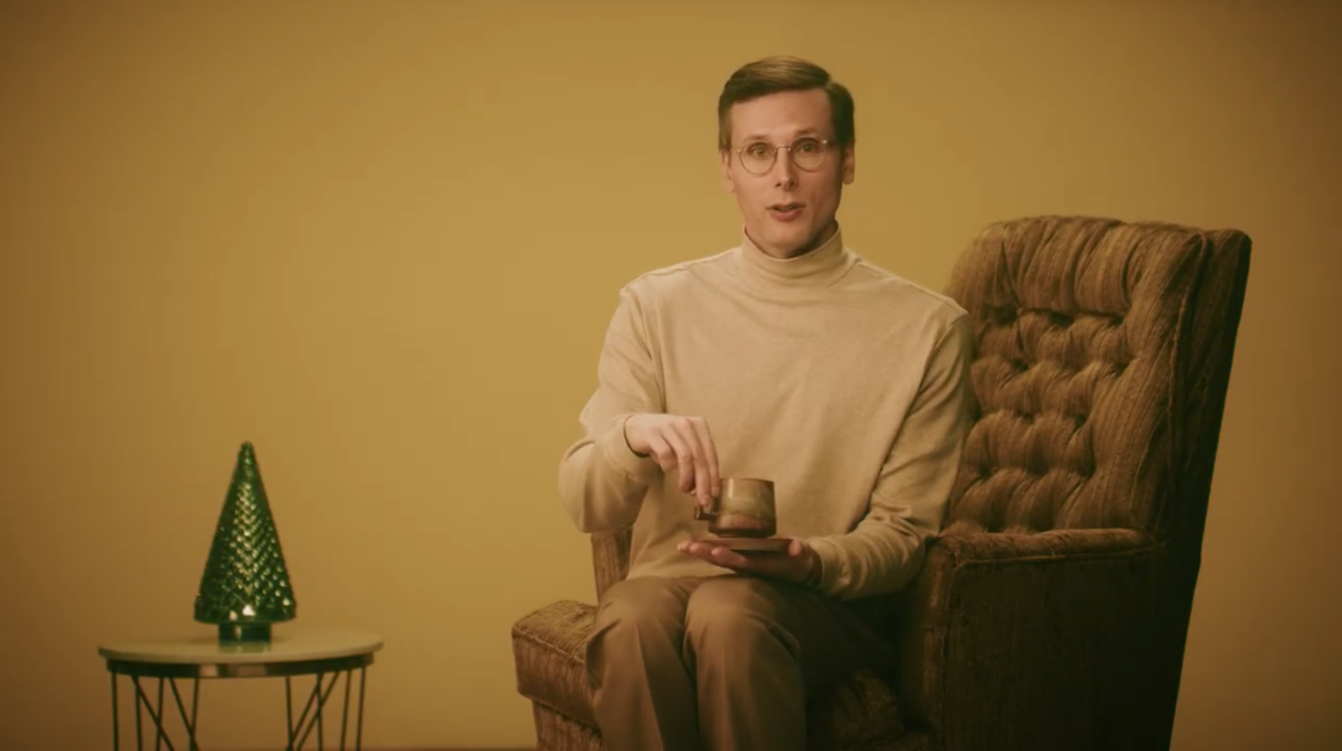 An awkward looking man poses as an AI chatbot that said harmful things to young users.