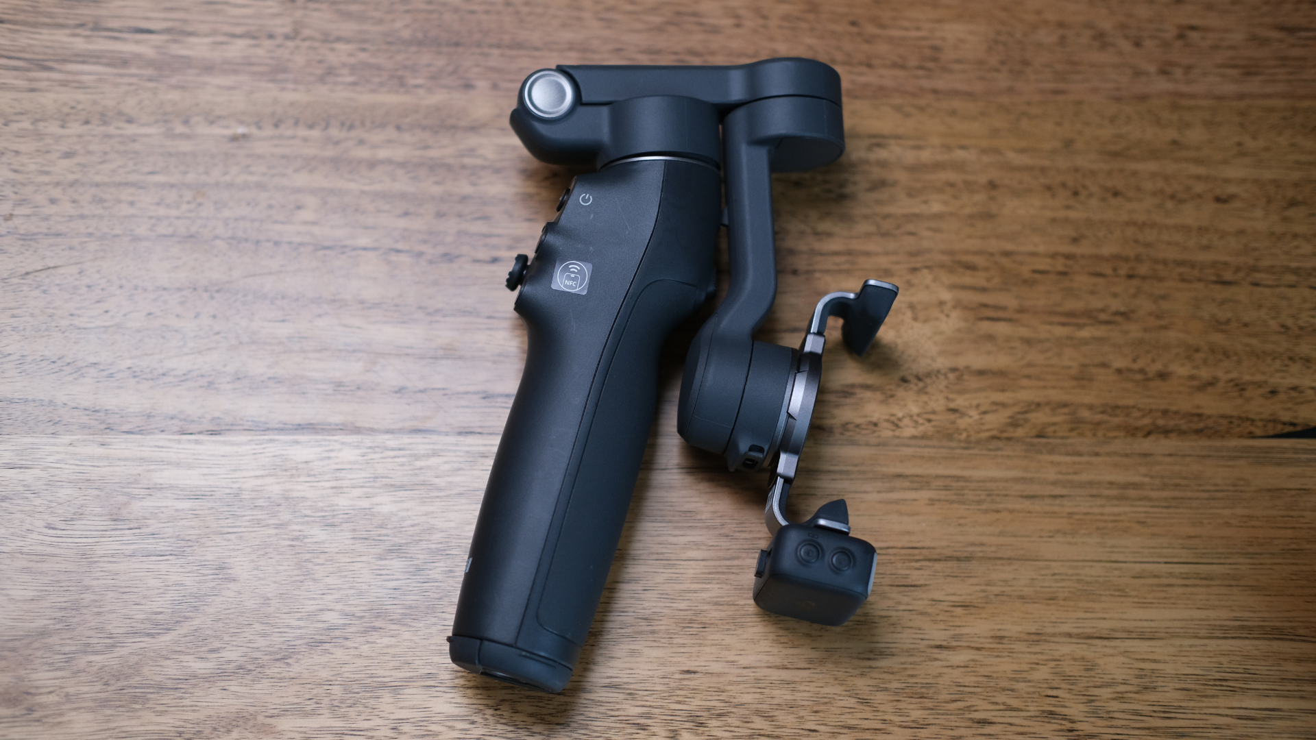 The DJI Osmo Mobile 8 folded up.