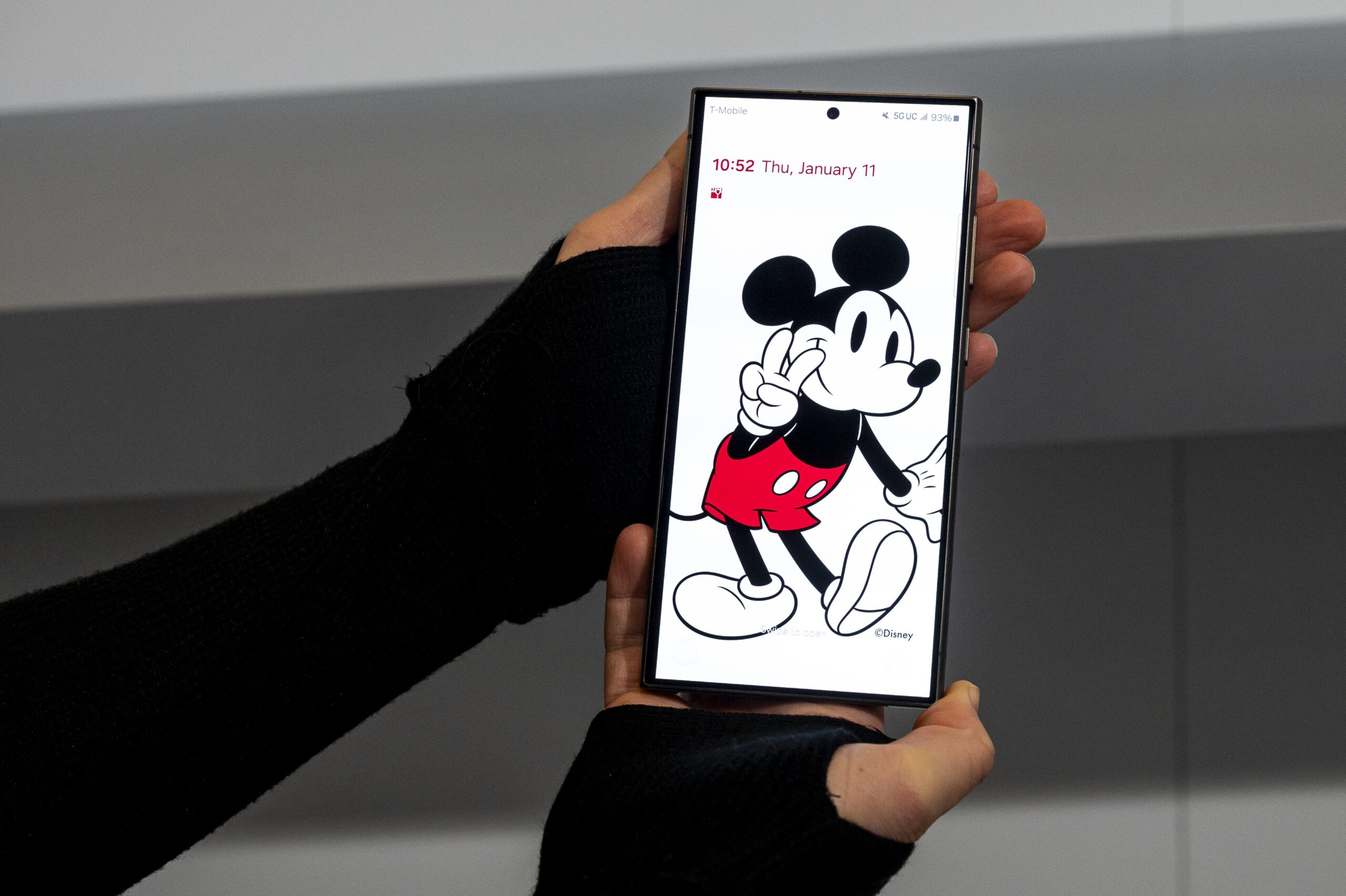 Mickey Mouse on smartphone screen