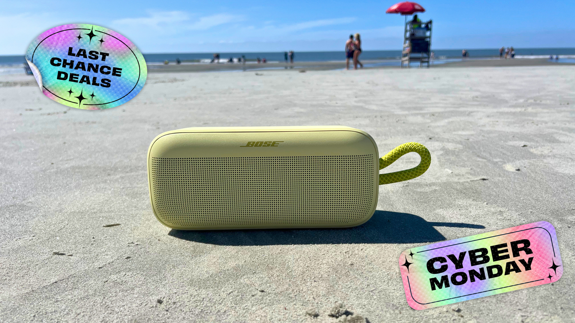 yellow bose soundlink plus speaker on the sand at the beach