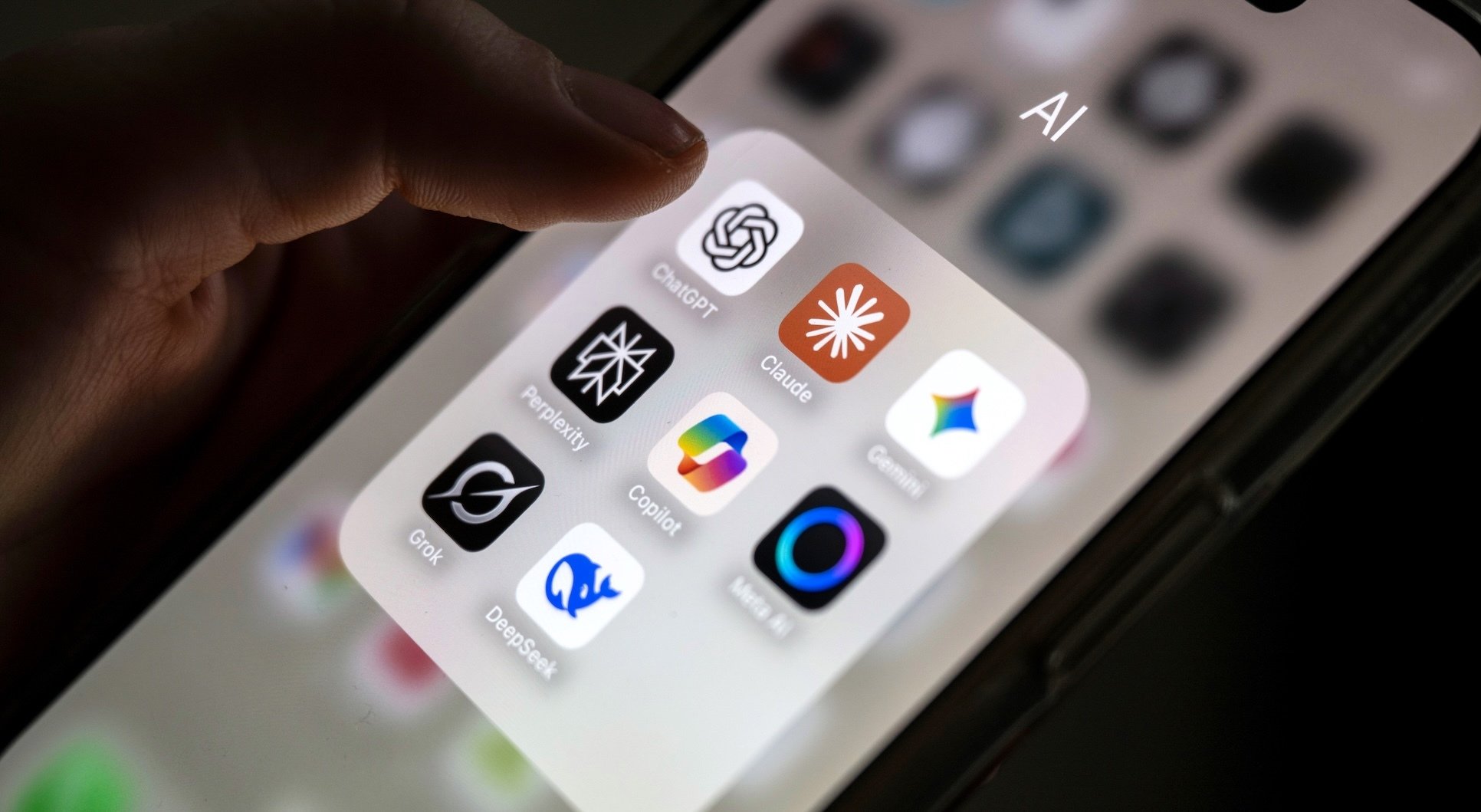 AI apps in a folder on an iPhone screen