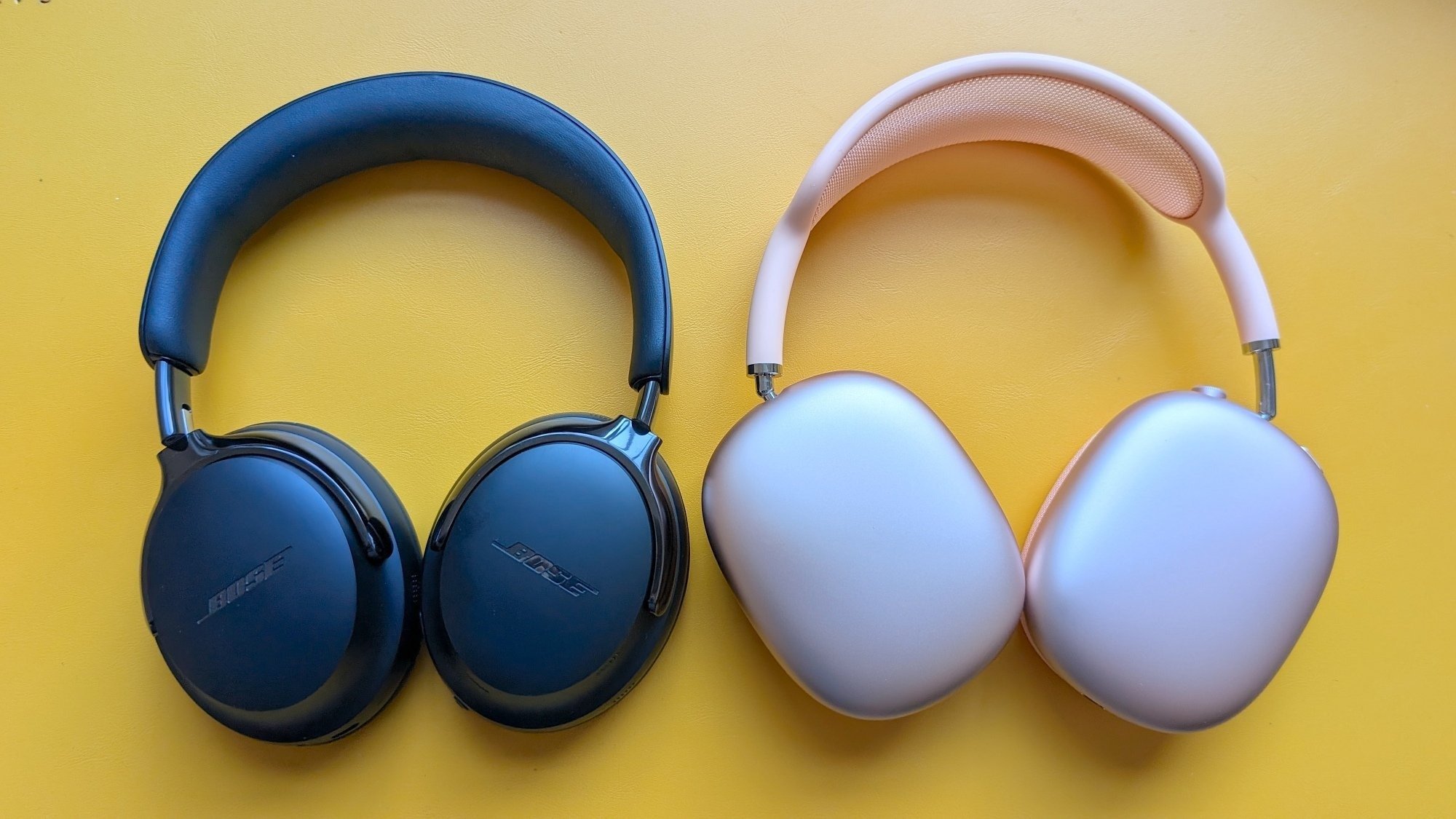 black bose qc ultra 2 headphones and silver airpods max