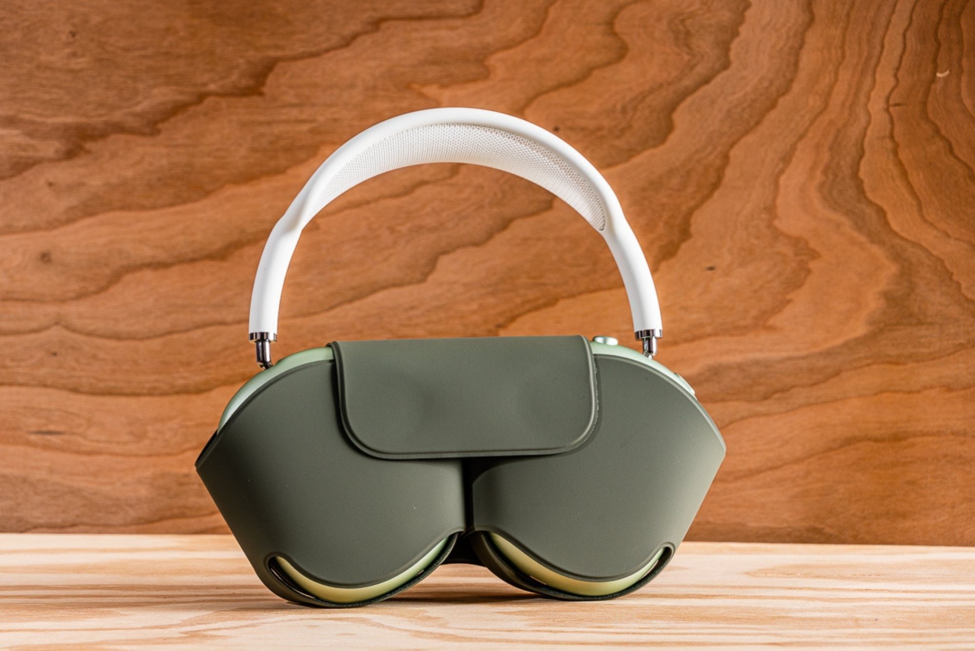 green airpods max headphones in case