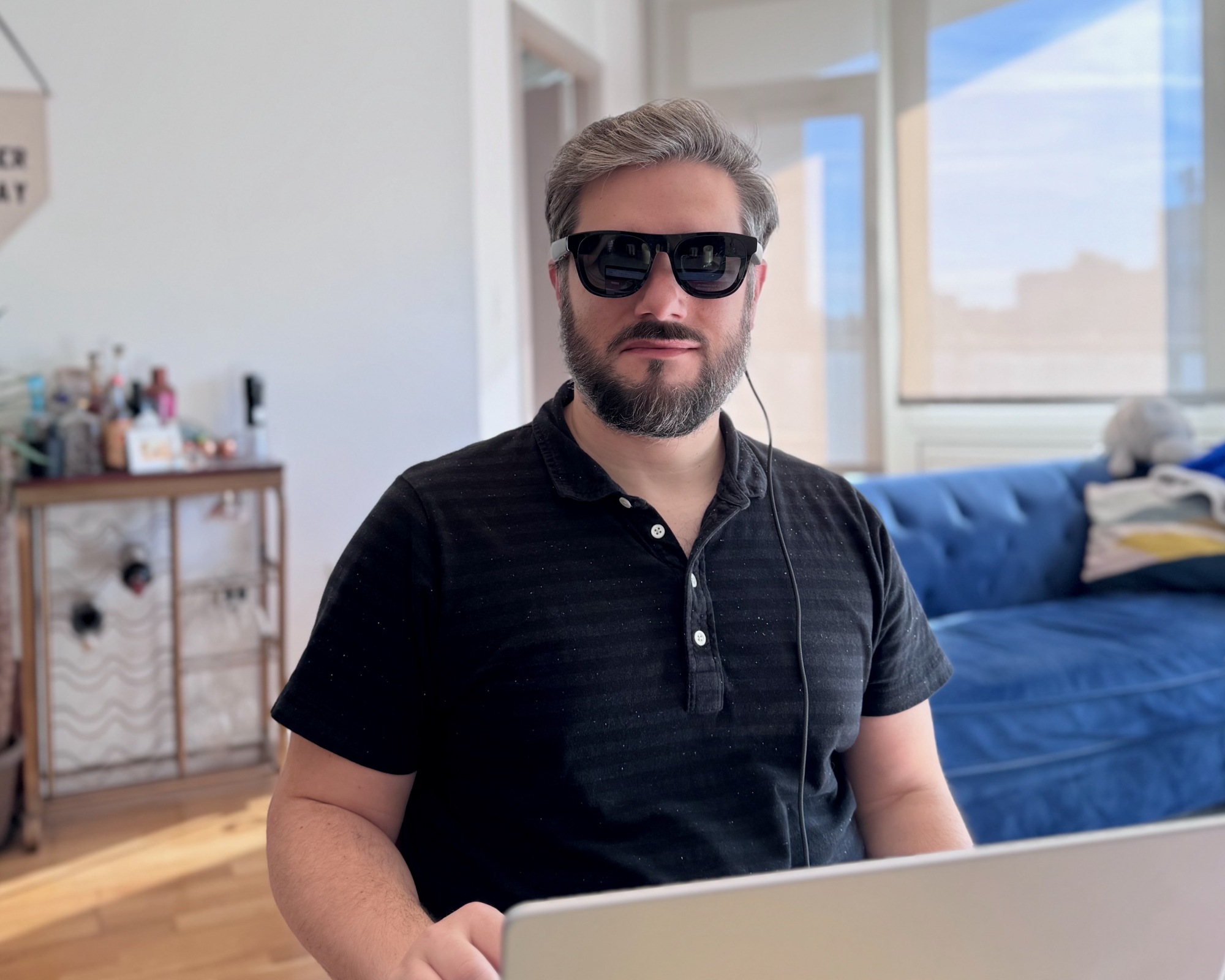 author wearing xreal one pro glasses