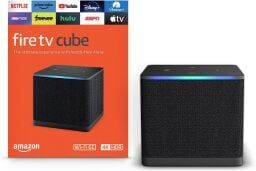 fire tv cube and box against a white background