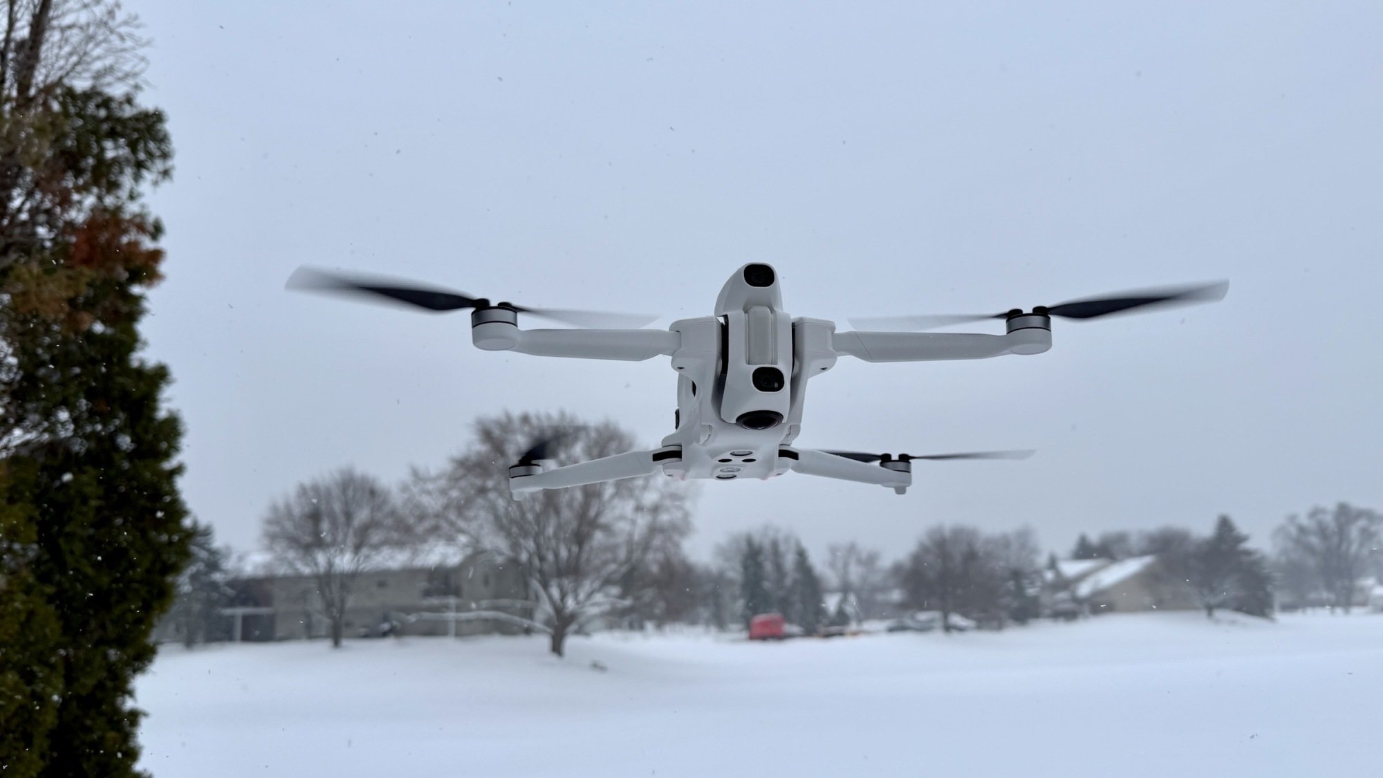antigravity a1 drone flying in snowy field