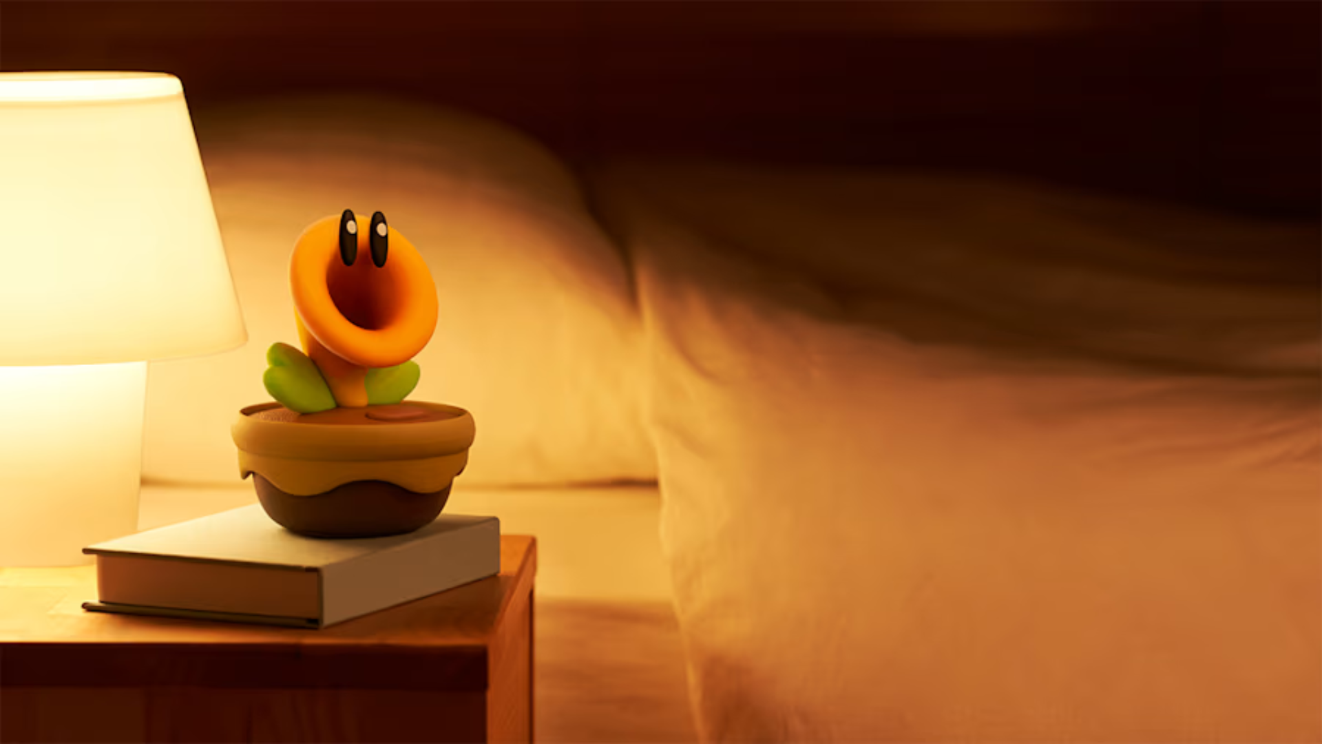 The Nintendo Talking Flower on a bedside table
