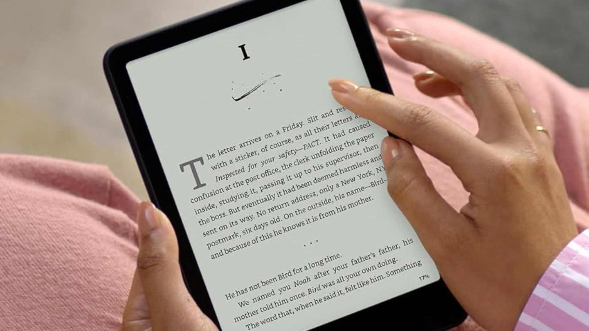 A person using a Kindle 