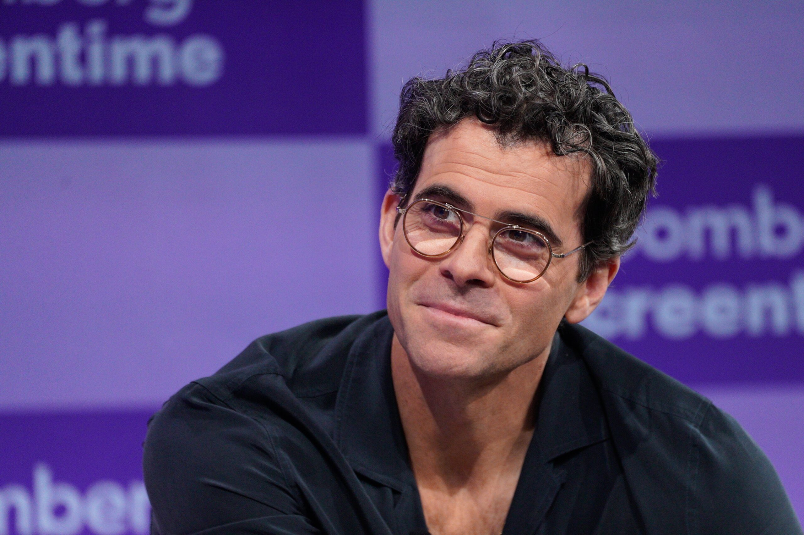 Instagram CEO Adam Mosseri photographed at a public speaking event. 