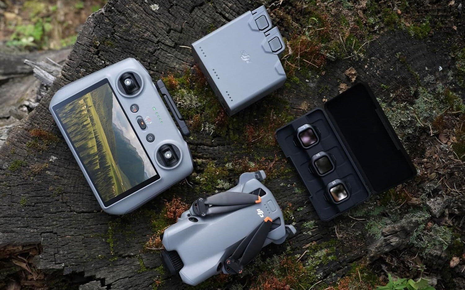 the DJI Mini 5 Pro Fly More Combo sitting outside with extra batteries and RC 2 remote