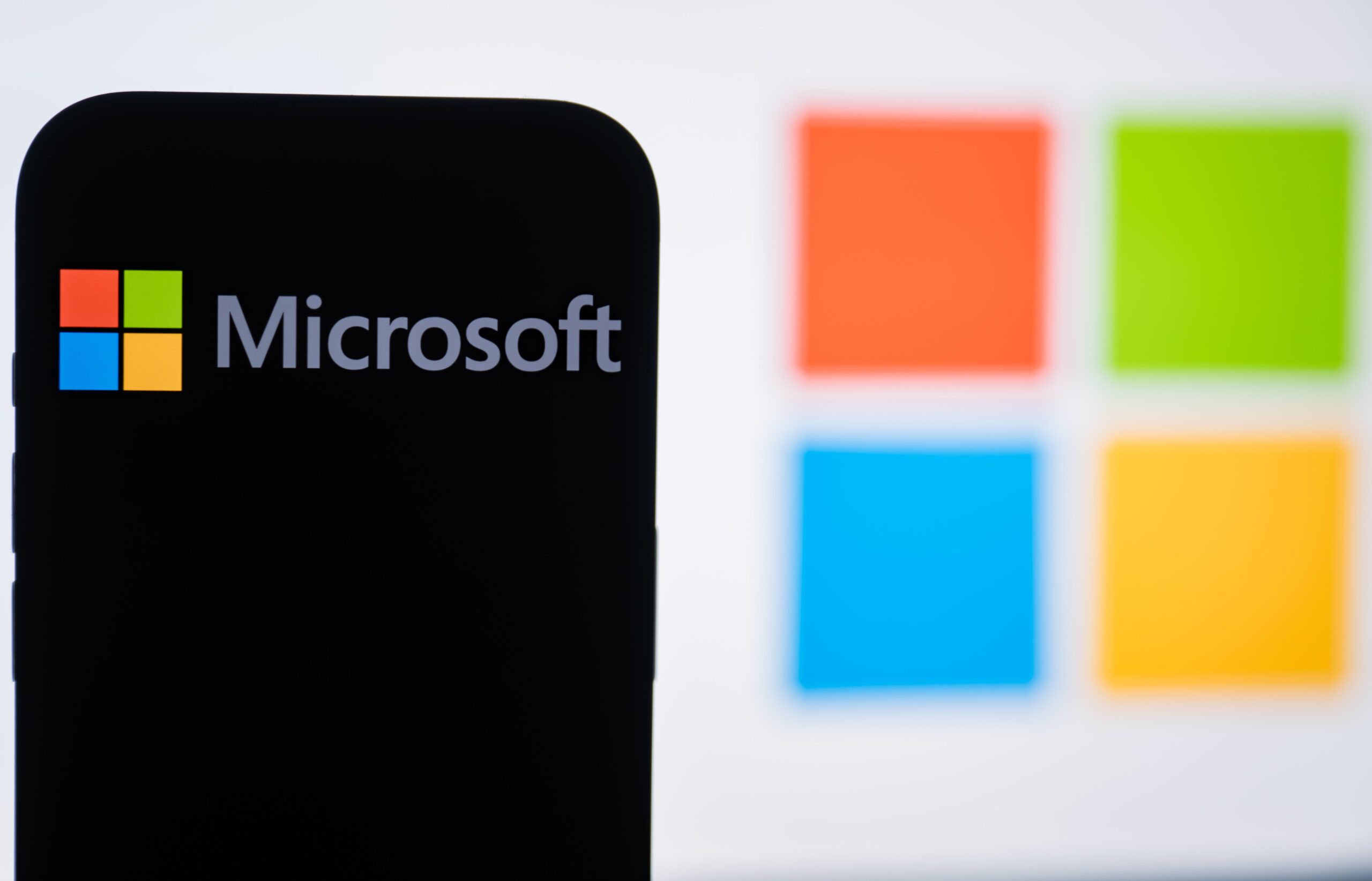 an illustrated screen with microsoft outage on it