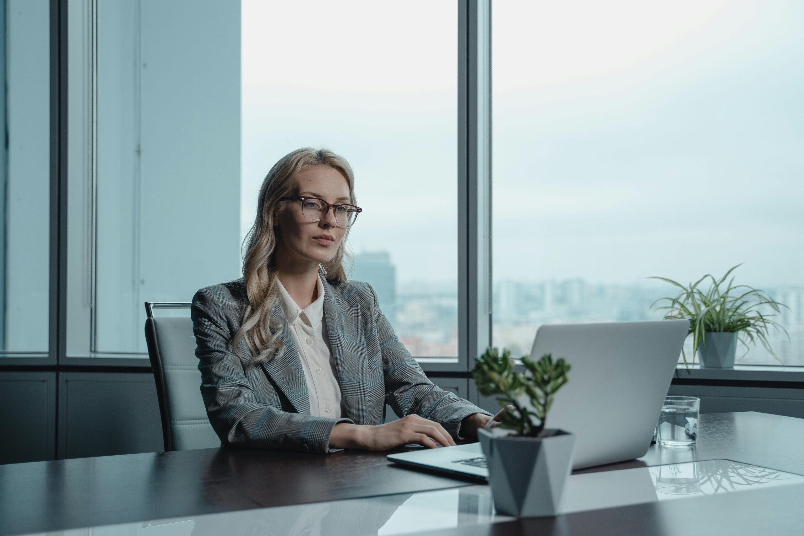 Woman using laptop in office