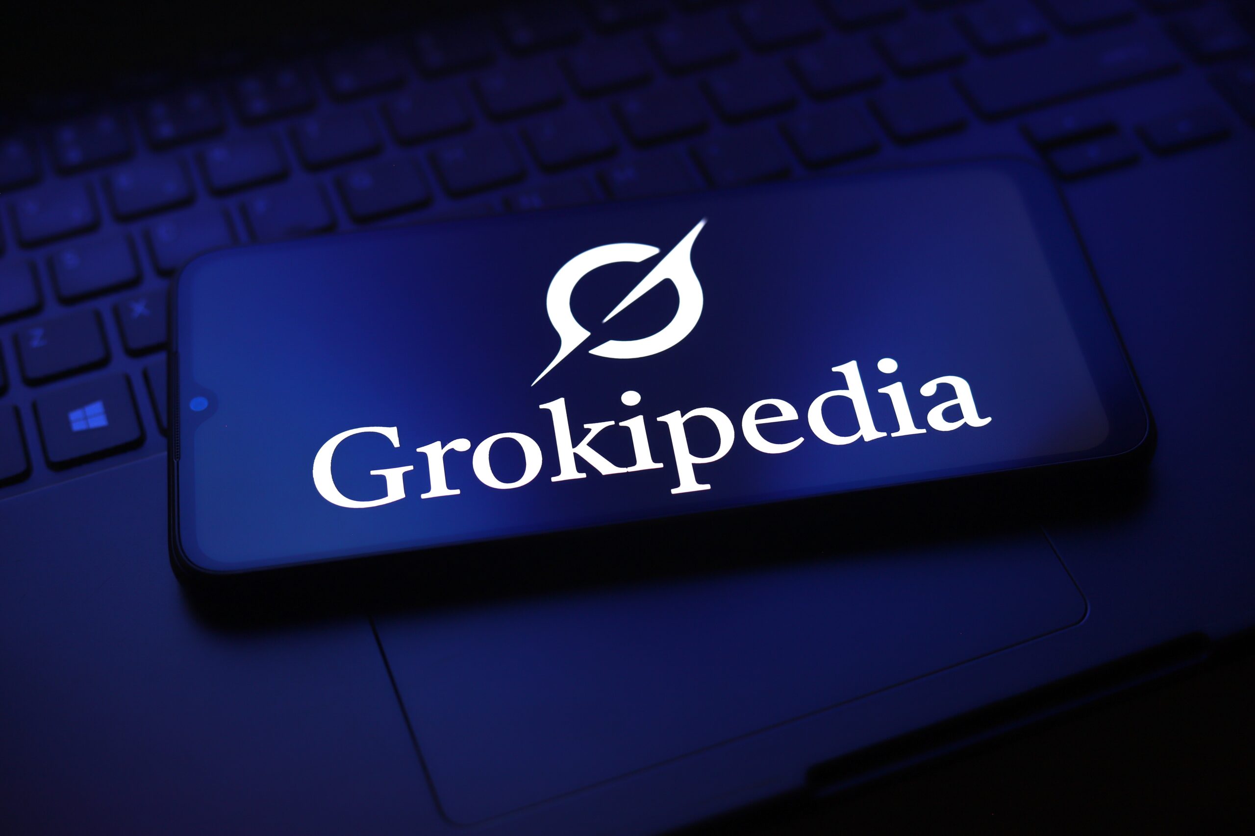 Grokipedia logo on mobile device