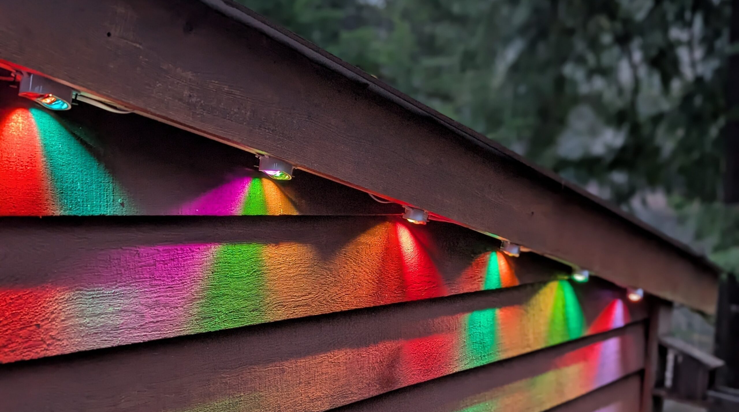 the Govee Permanent Outdoor Lights Prism outside under a roof eve