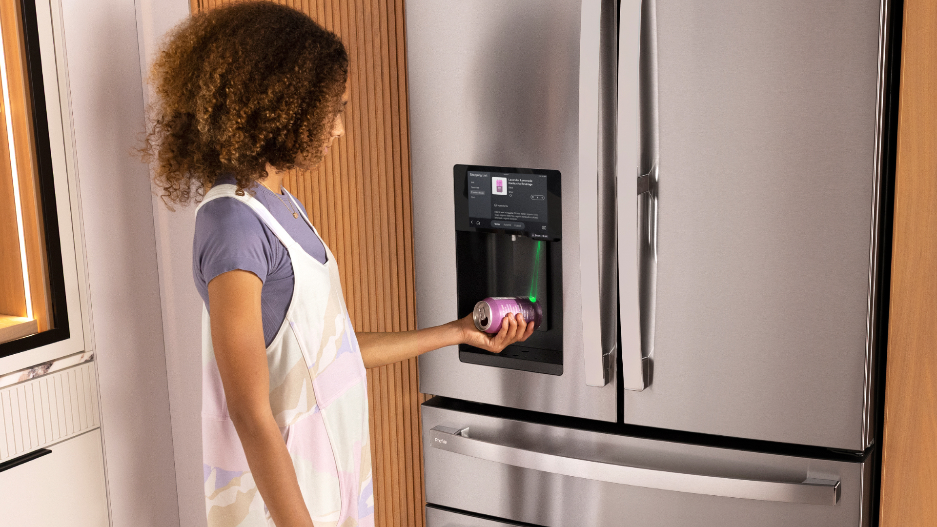 person scanning item with GE smart fridge barcode scanner