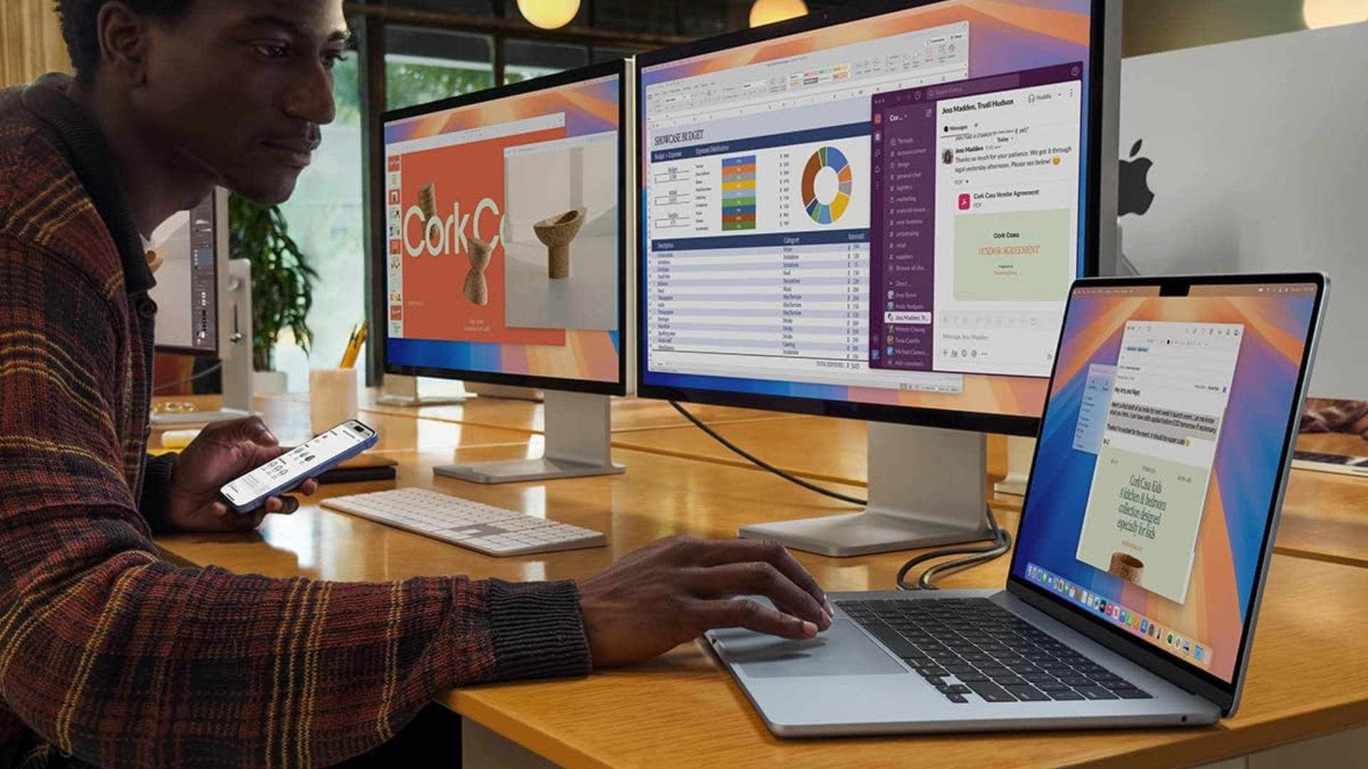 A person working on an Apple MacBook Air