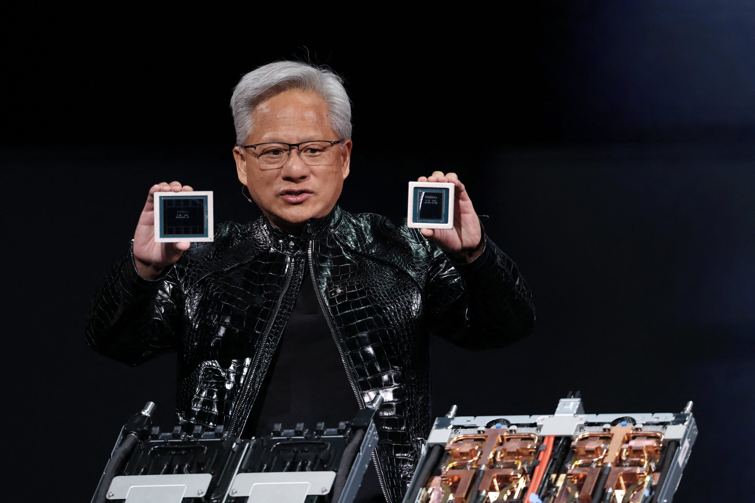 nvidia ceo holding chips on stage