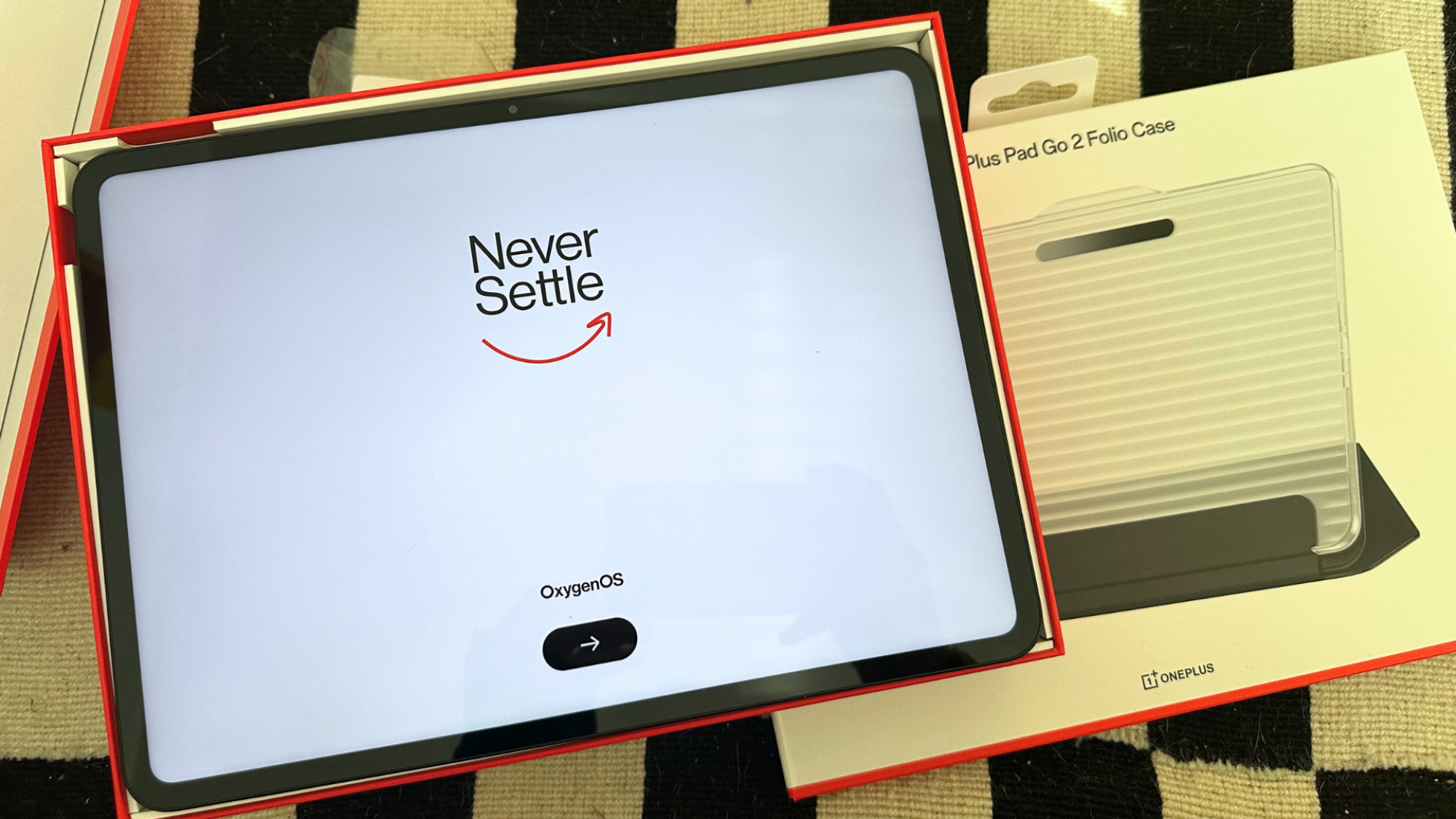A OnePlus tablet with the setup screen