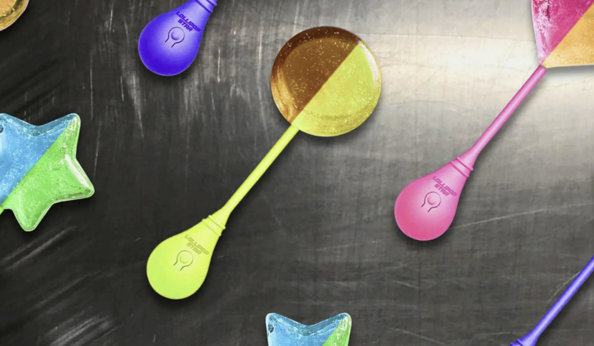 lolliop stars laid out on a black backgound