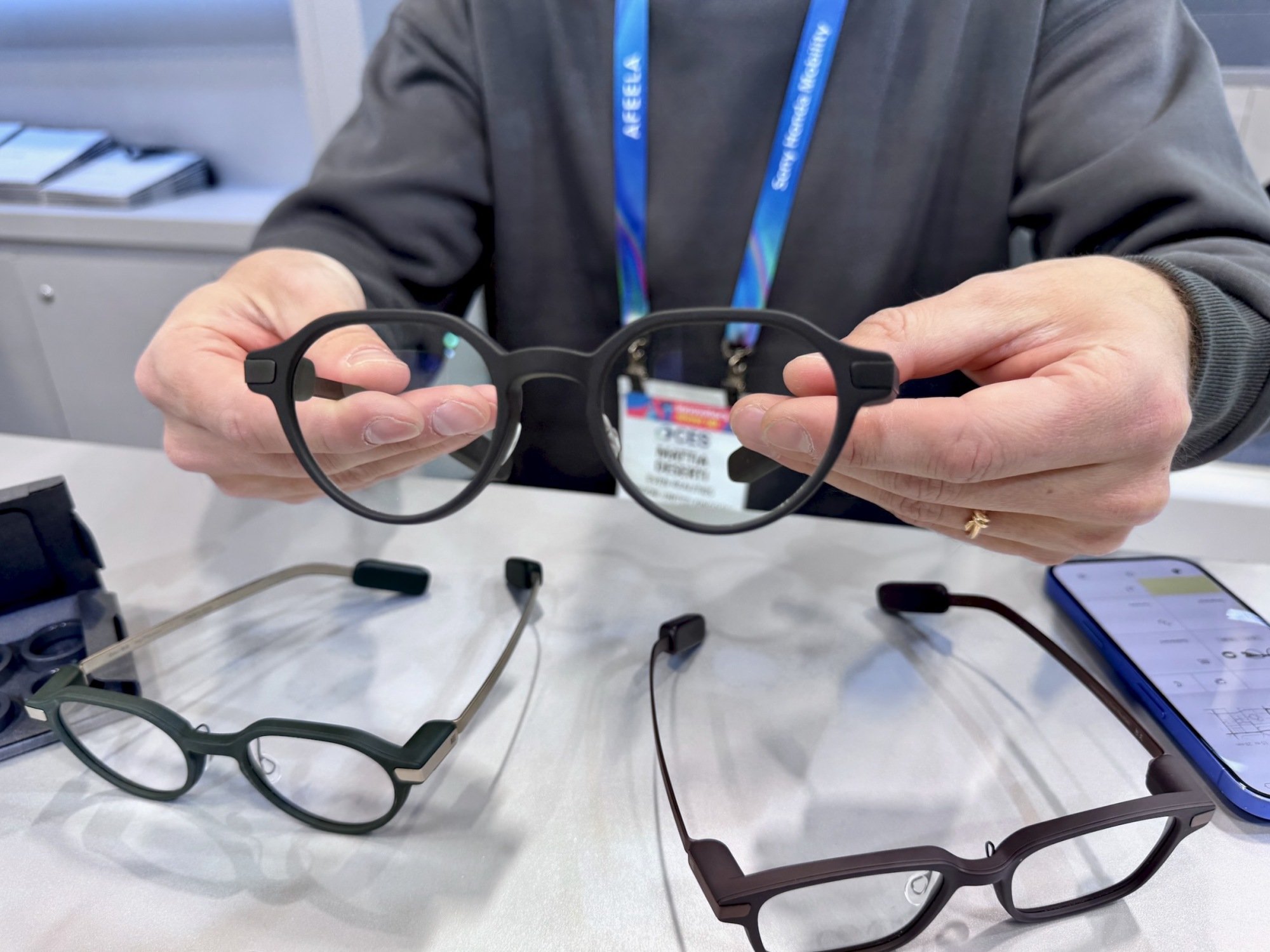 even realities g2 smart glasses held in hand during demonstration at ces 2026