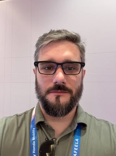 Timothy Werth wearing MemoMind Memo One AI Glasses at CES 2026.