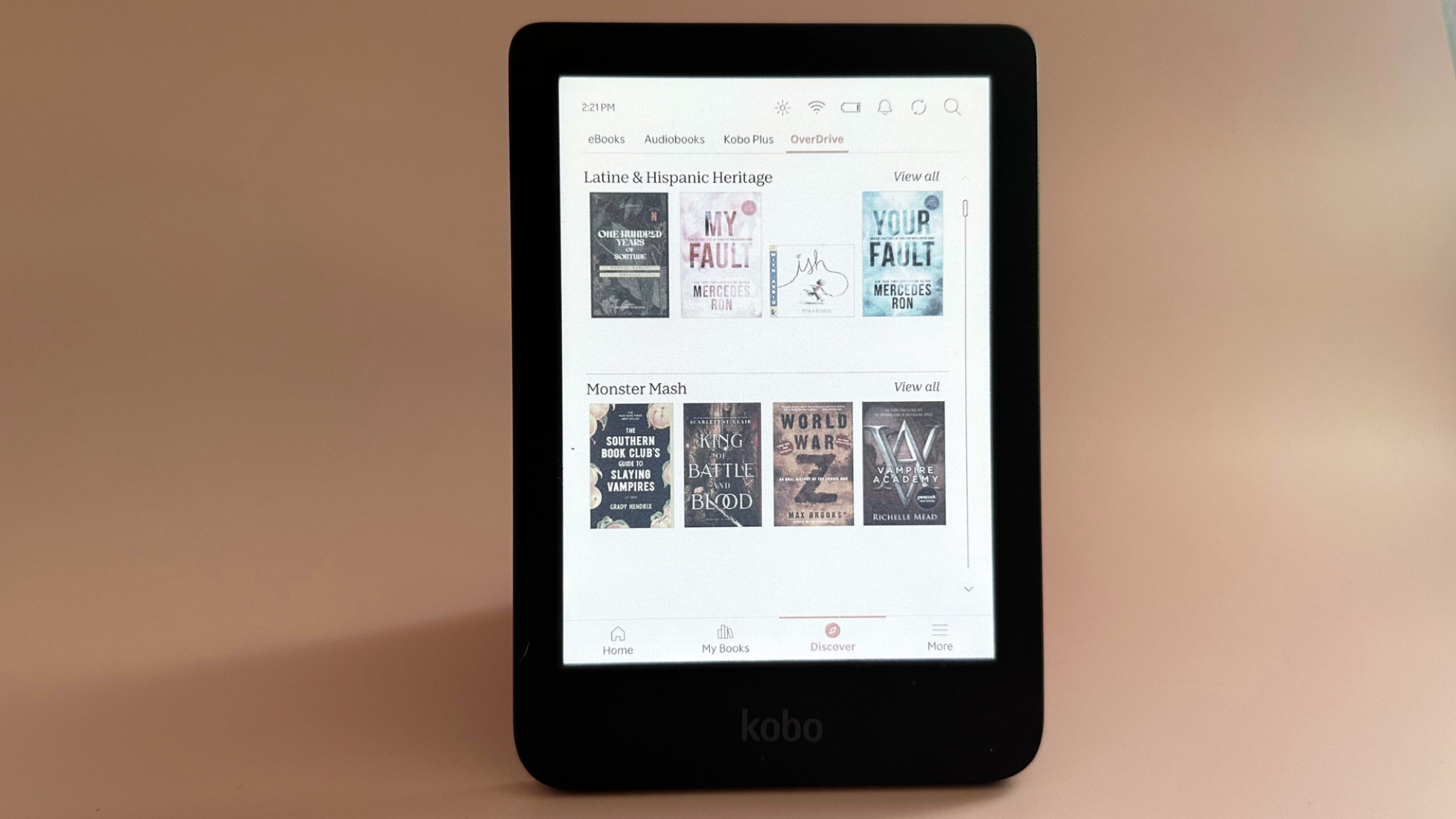 A Kobo Clara Colour on a pale pink background