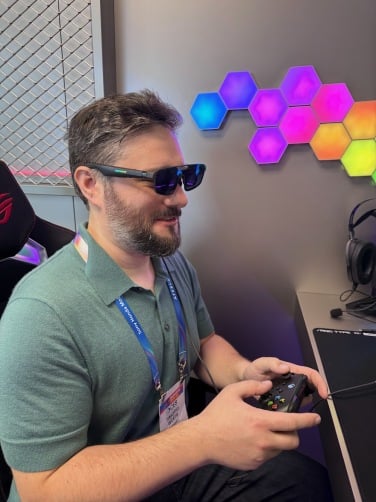 journalist timothy werth wearing xreal ROG r1 smart glasses at CES 2026