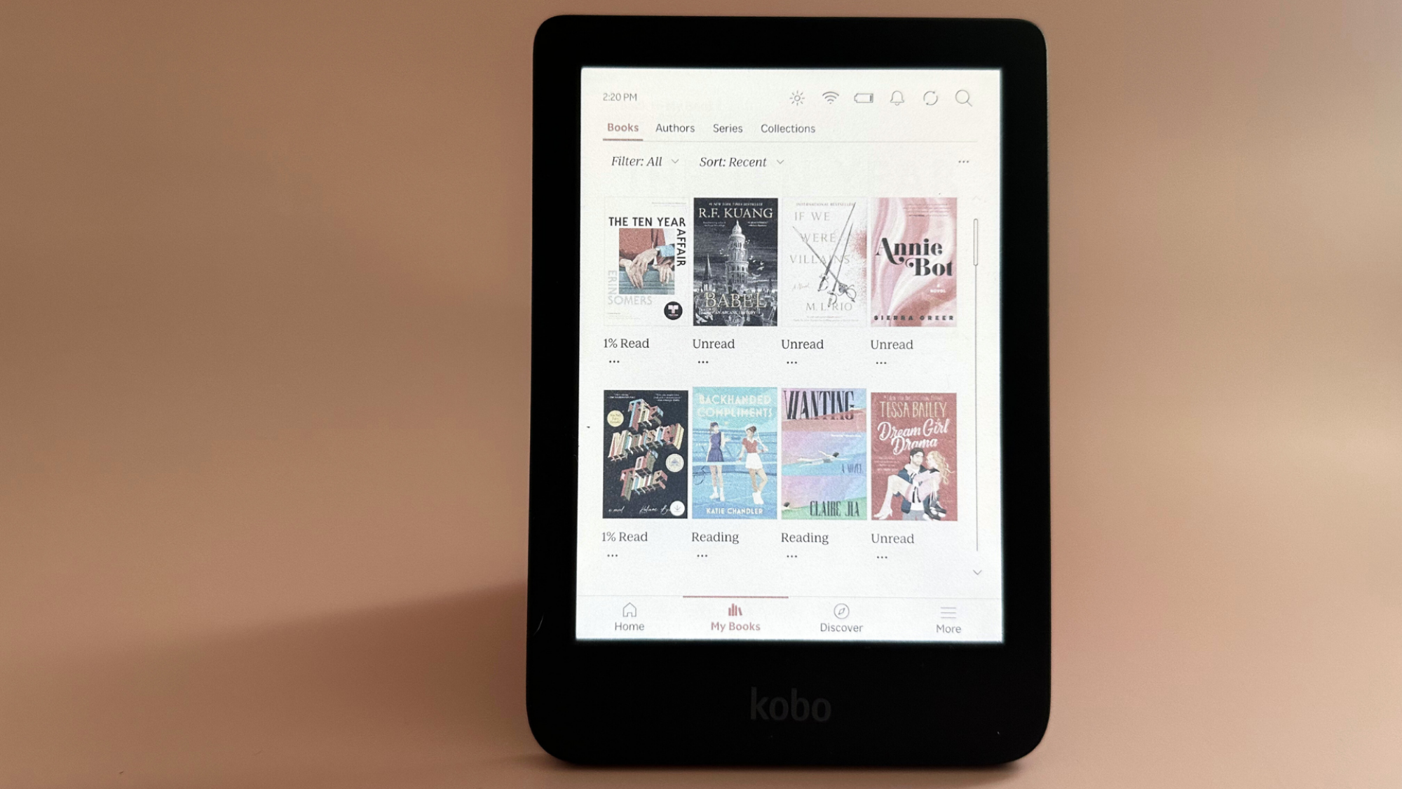 A Kobo Clara Colour on a pale pink background
