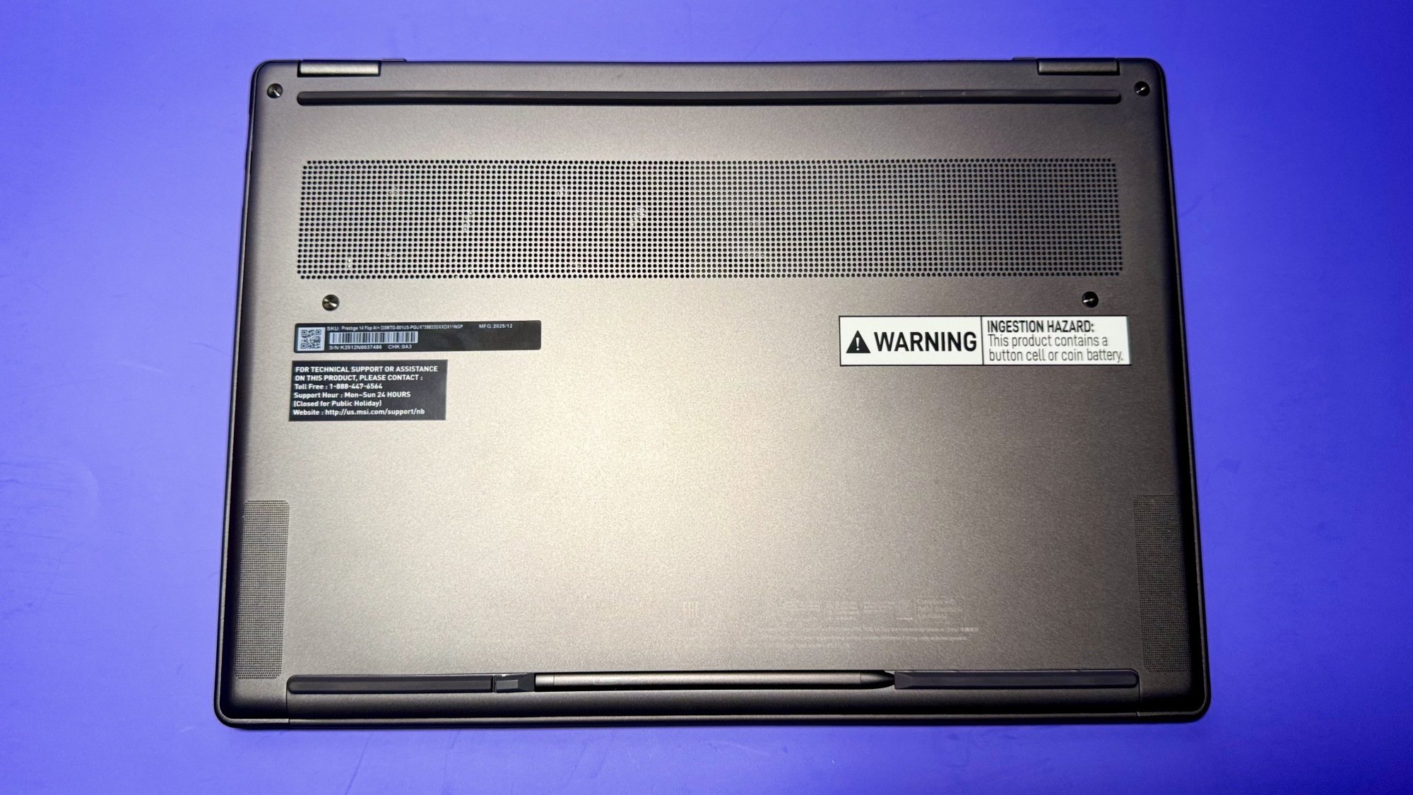 the bottom of the msi prestige 14 flip ai+