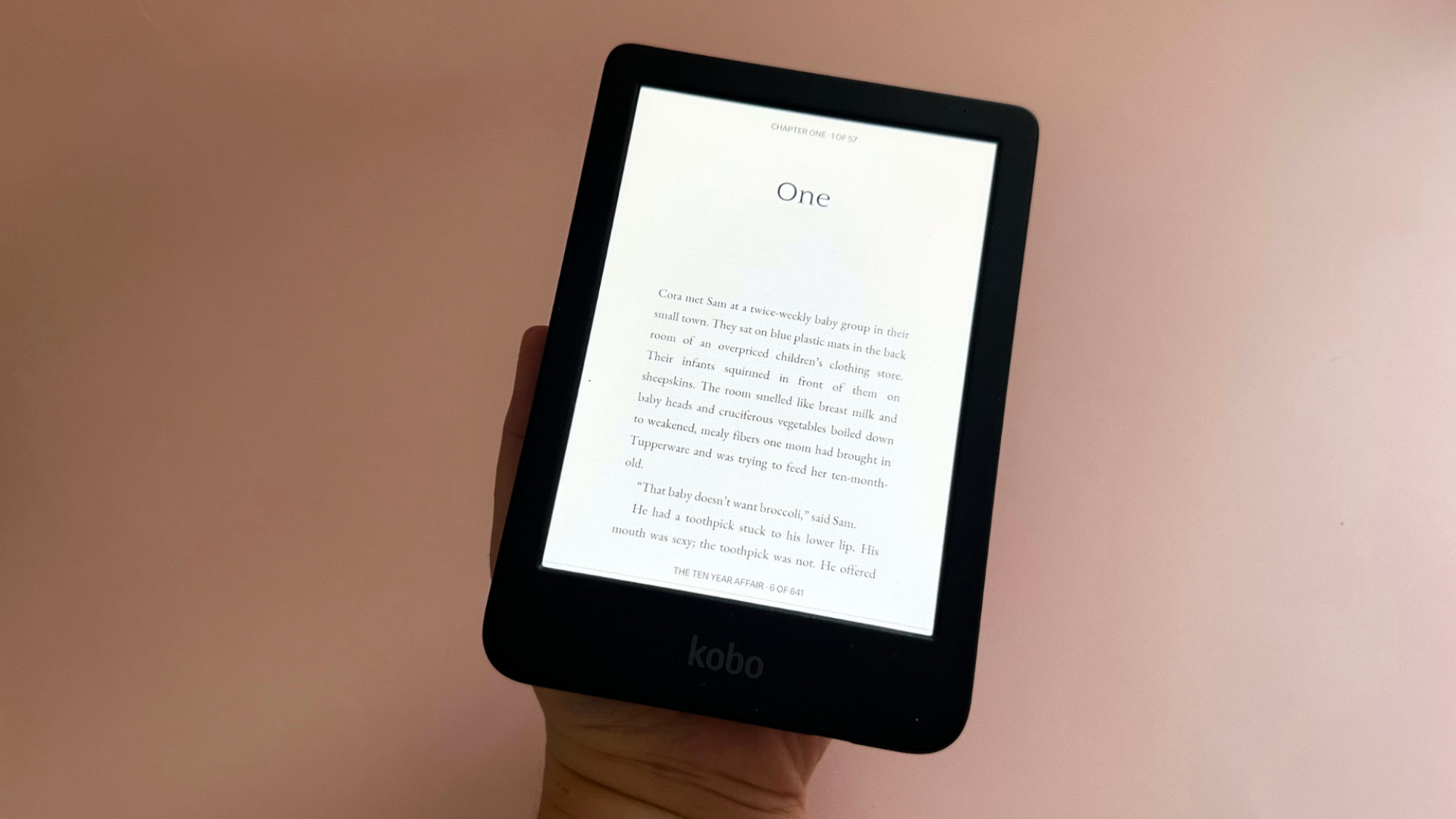 A Kobo Clara Colour in the palm of someone's hand