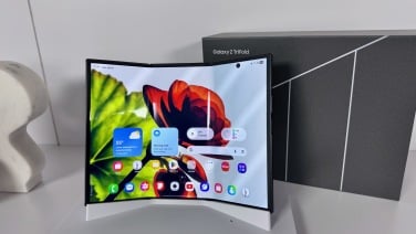 galaxy z trifold with box on display