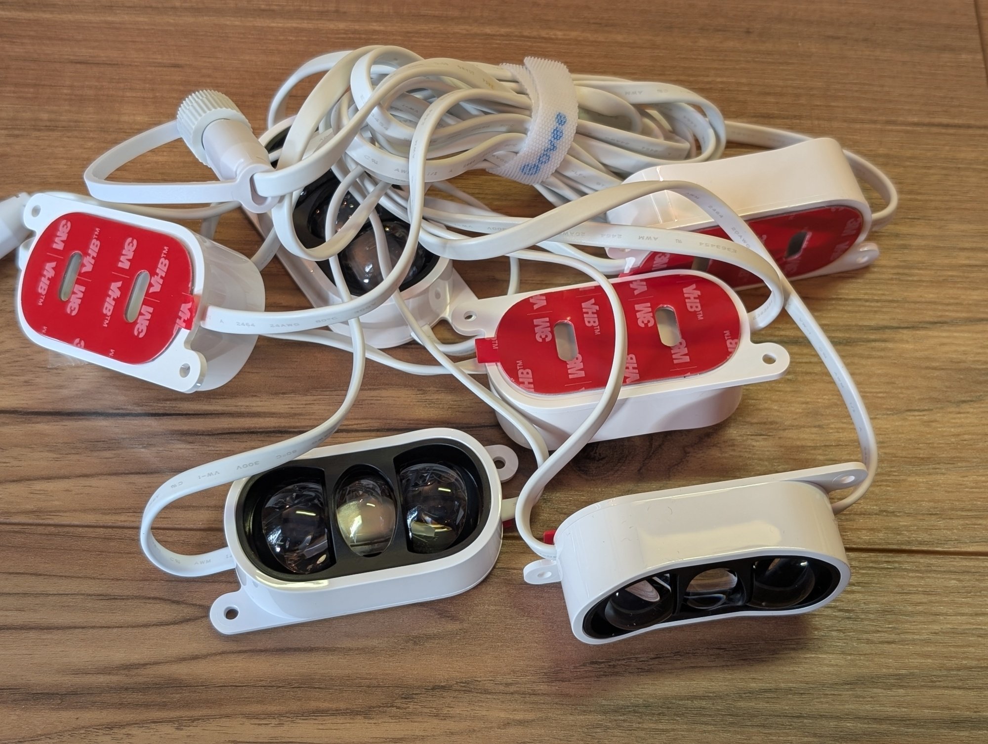 the Govee Permanent Outdoor Lights Prism sit in a pile on the ground