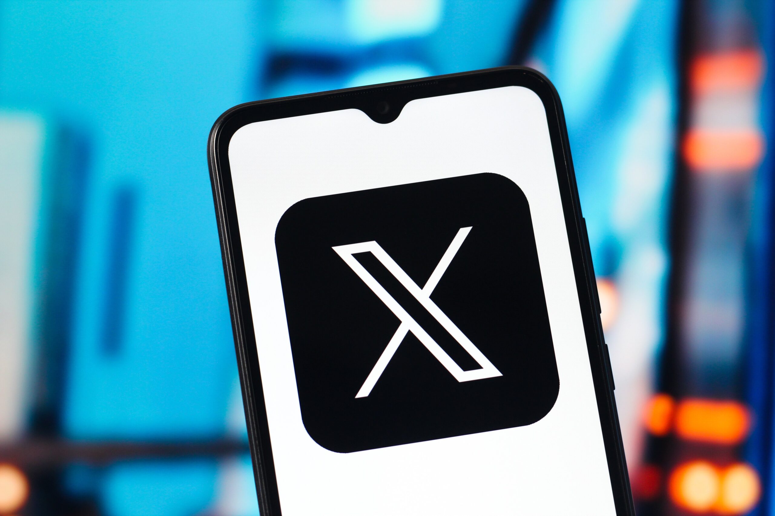 x logo on smartphone