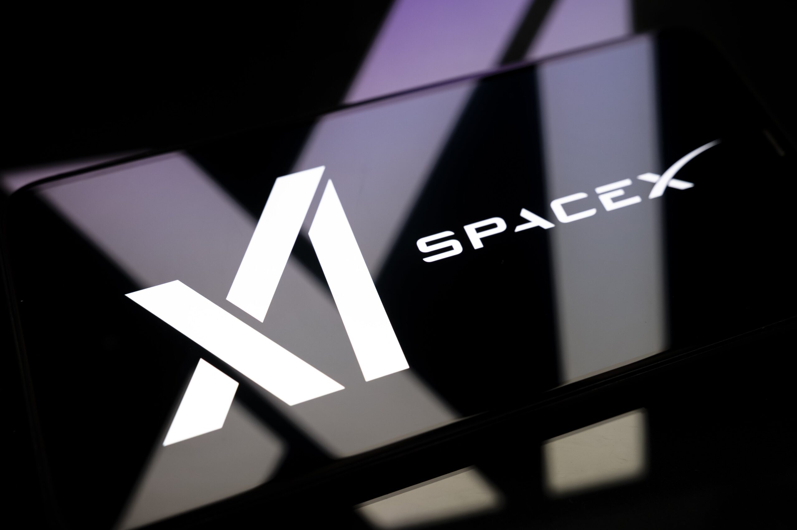 SpaceX and xAI logos