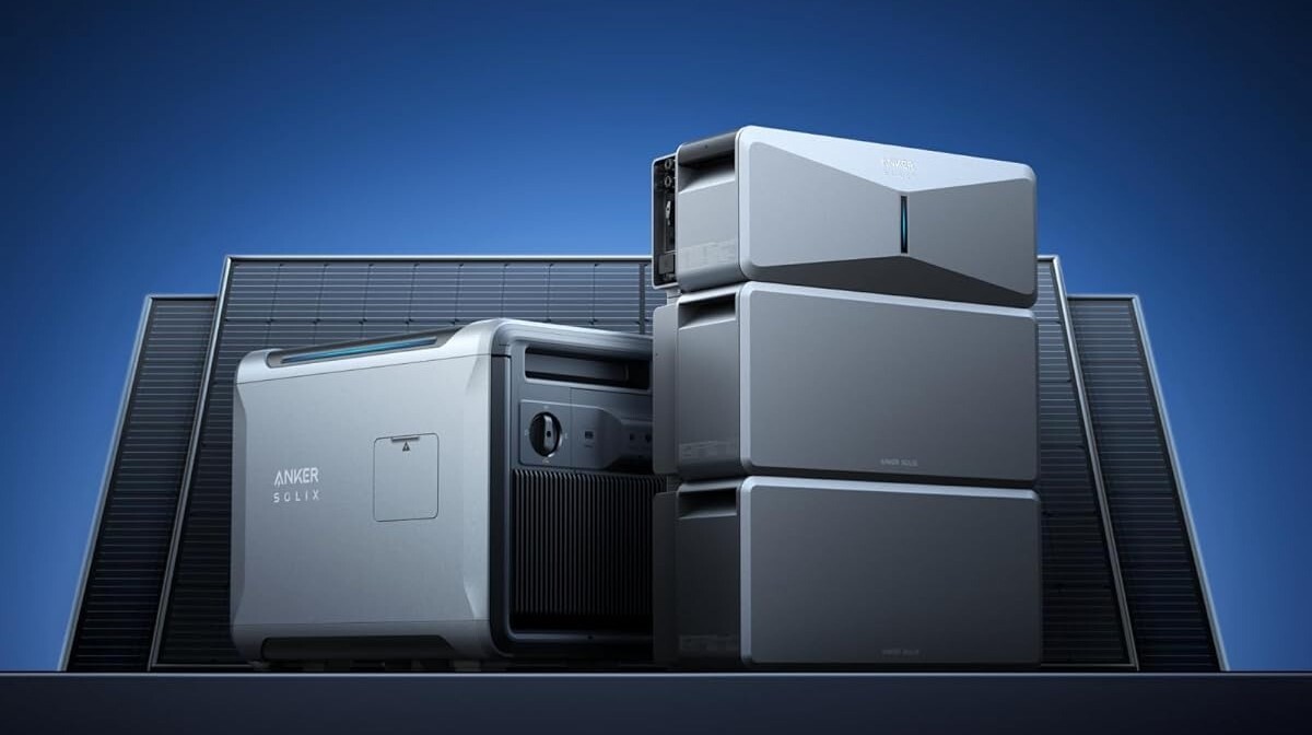 the Anker Solix E10 stacked up with solar panels behind it