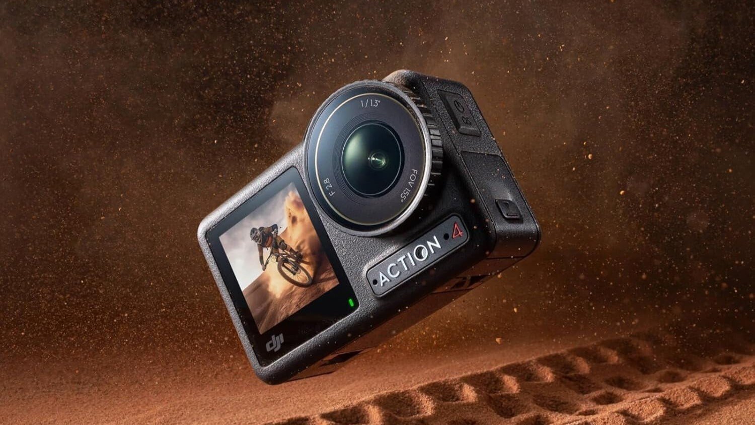 the DJI Omso action 4 camera falling into sand with tire tracks in it